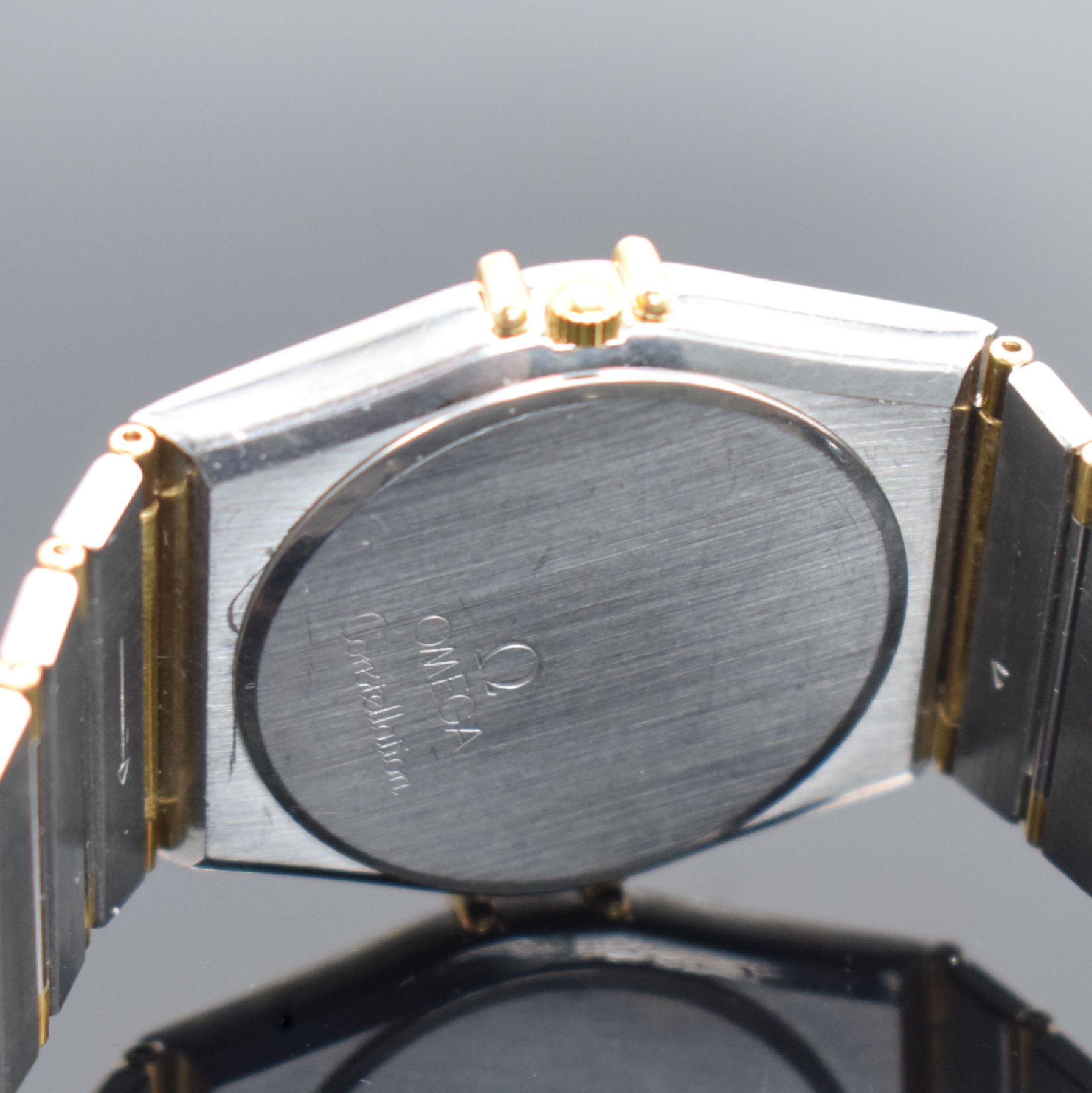 Detail d: OMEGA Constellation Armbanduhr in Stahl/Gold Referenz 3961070, Schweiz um 1990, quartz, gedr. Geh., Goldlünette m. röm. Zahlen, orig. Stahl/Gold ...