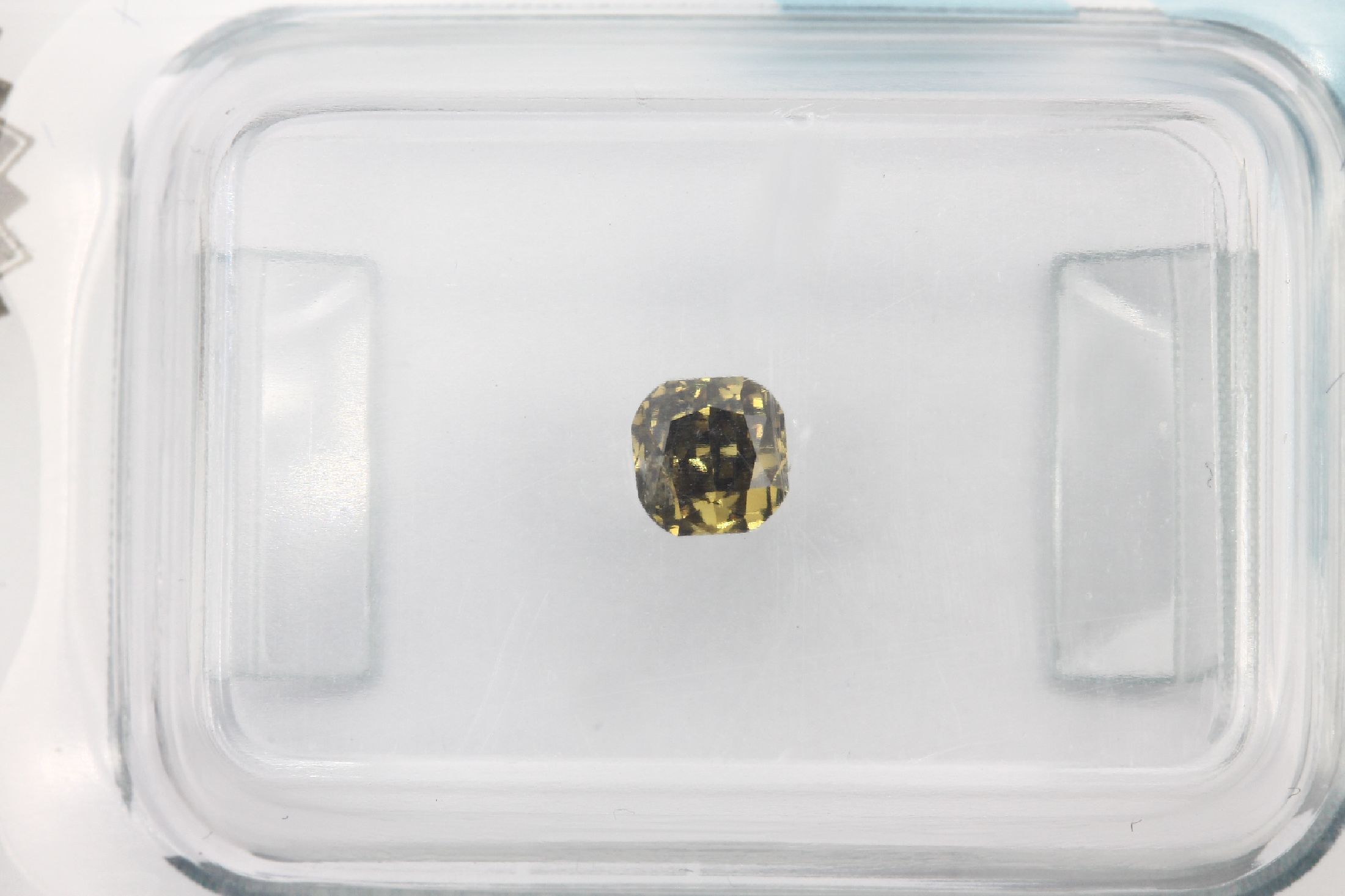 Diamant im Kissenschliff 0.30 ct, Fancy Natural/p1, verschweißt, IGI Expertise