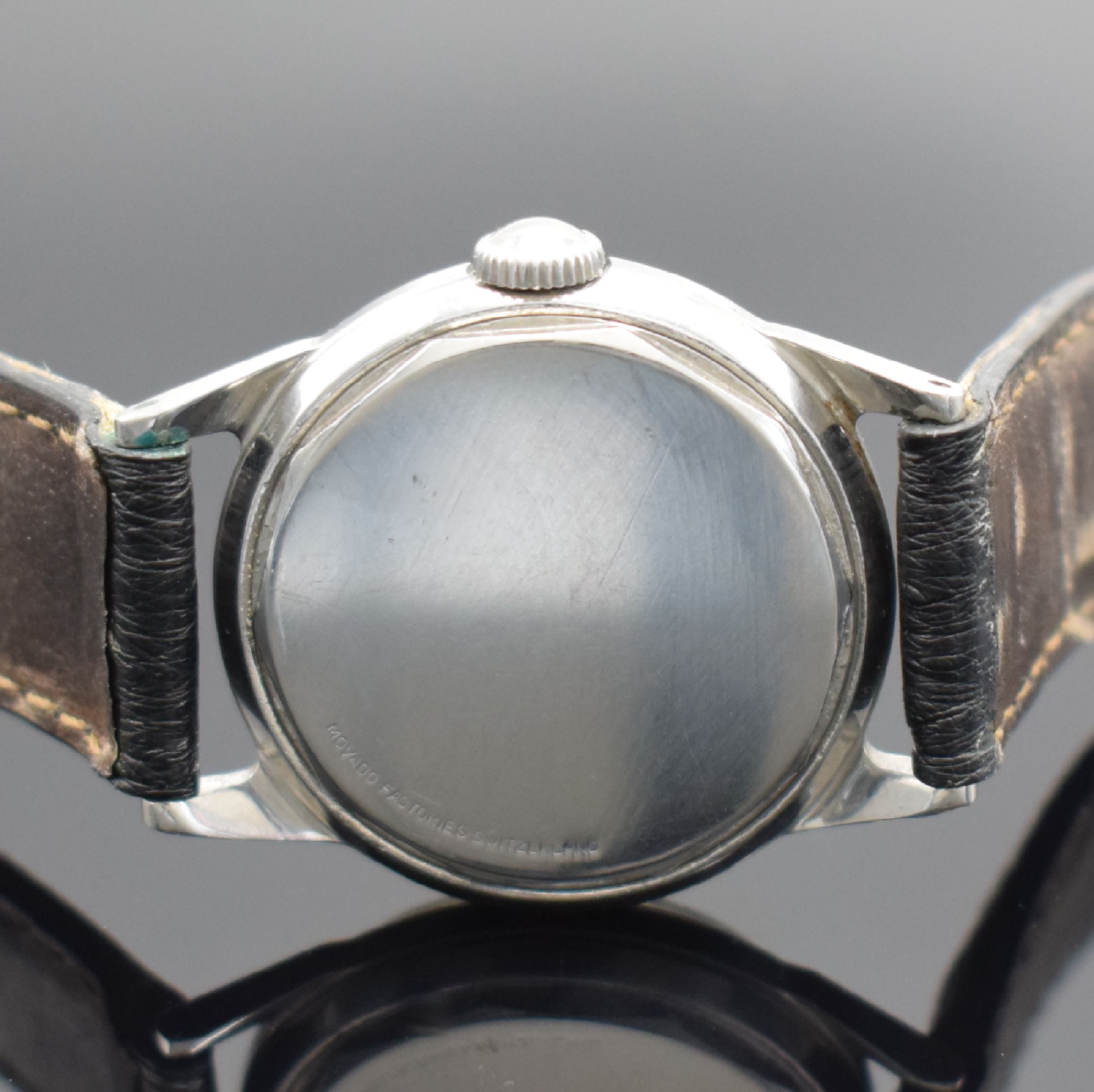 Detail c: MOVADO Armbanduhr in Stahl Referenz 14760, Schweiz um 1945, Handaufzug, verschr. F.B. Geh., orig. Krone, silb. Zifferbl. rest., arab. Zahlen, ...