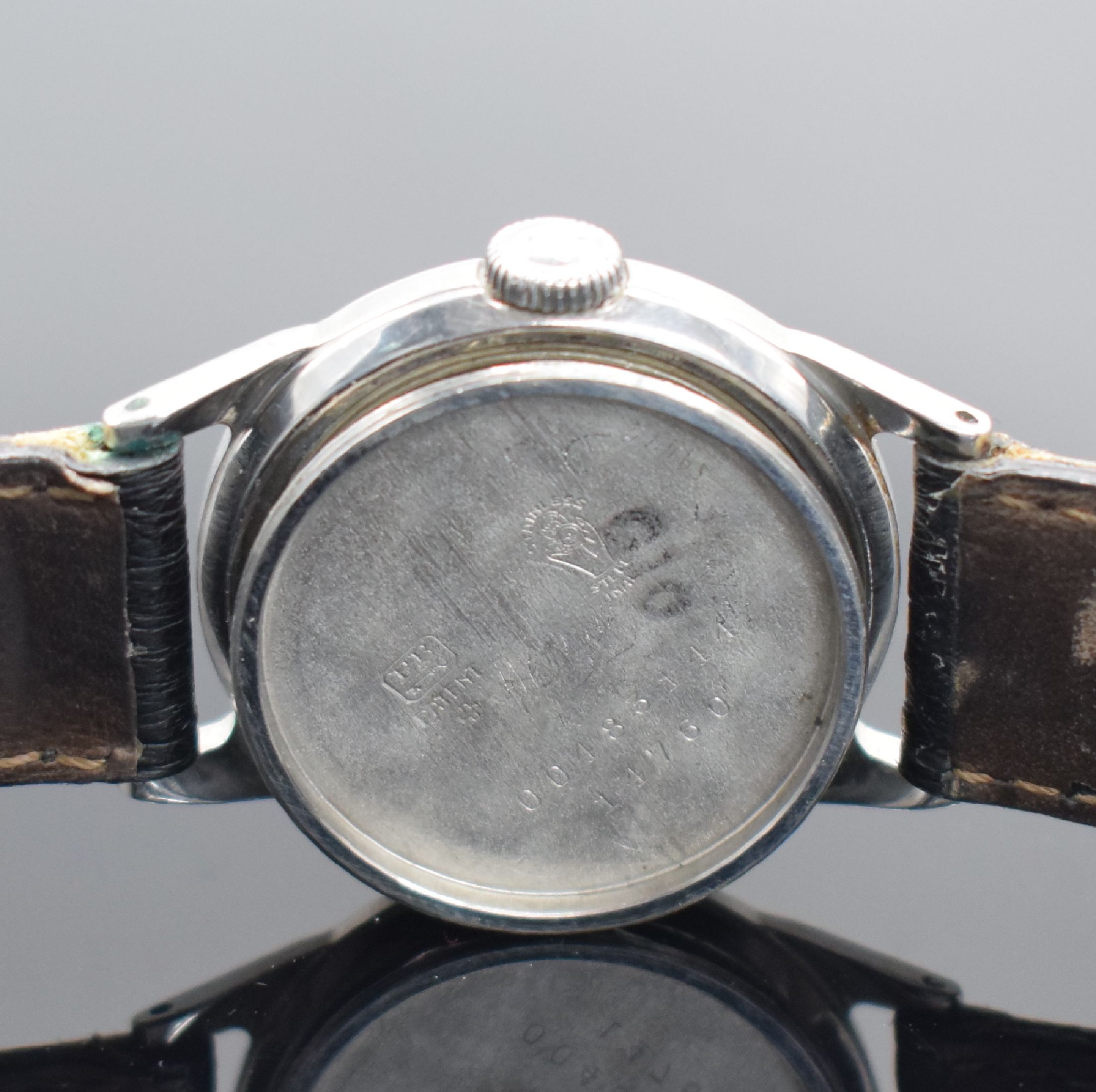 Detail f: MOVADO Armbanduhr in Stahl Referenz 14760, Schweiz um 1945, Handaufzug, verschr. F.B. Geh., orig. Krone, silb. Zifferbl. rest., arab. Zahlen, ...