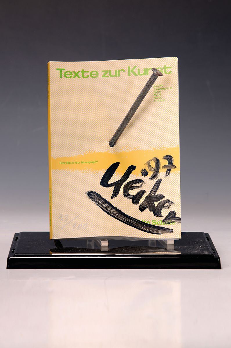 Detail k: Günther Uecker, geb. 1930, Multiple: Nagelobjekt, von einem massiven Nagel durchstoßenes Buch, Nagellänge 26 cm, datiert 1997, nummeriert 33/200, ...