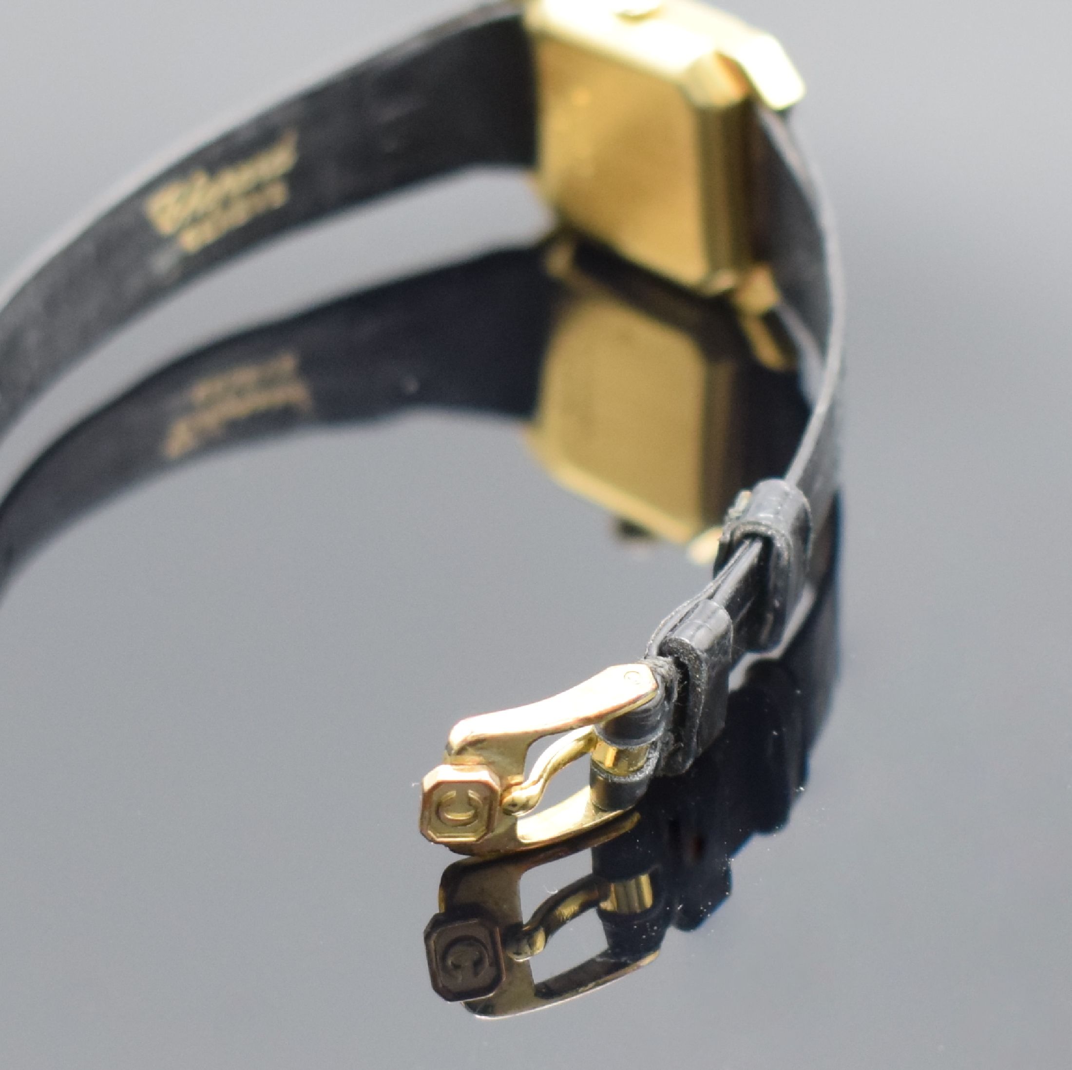 Detail b: CHOPARD Damenarmbanduhr in GG 750/000 Referenz 5120, Handaufzug, Schweiz um 1975, Boden aufgedr., Bandanst. m. 8 Diamanten bes., orig. Lederband m. ...