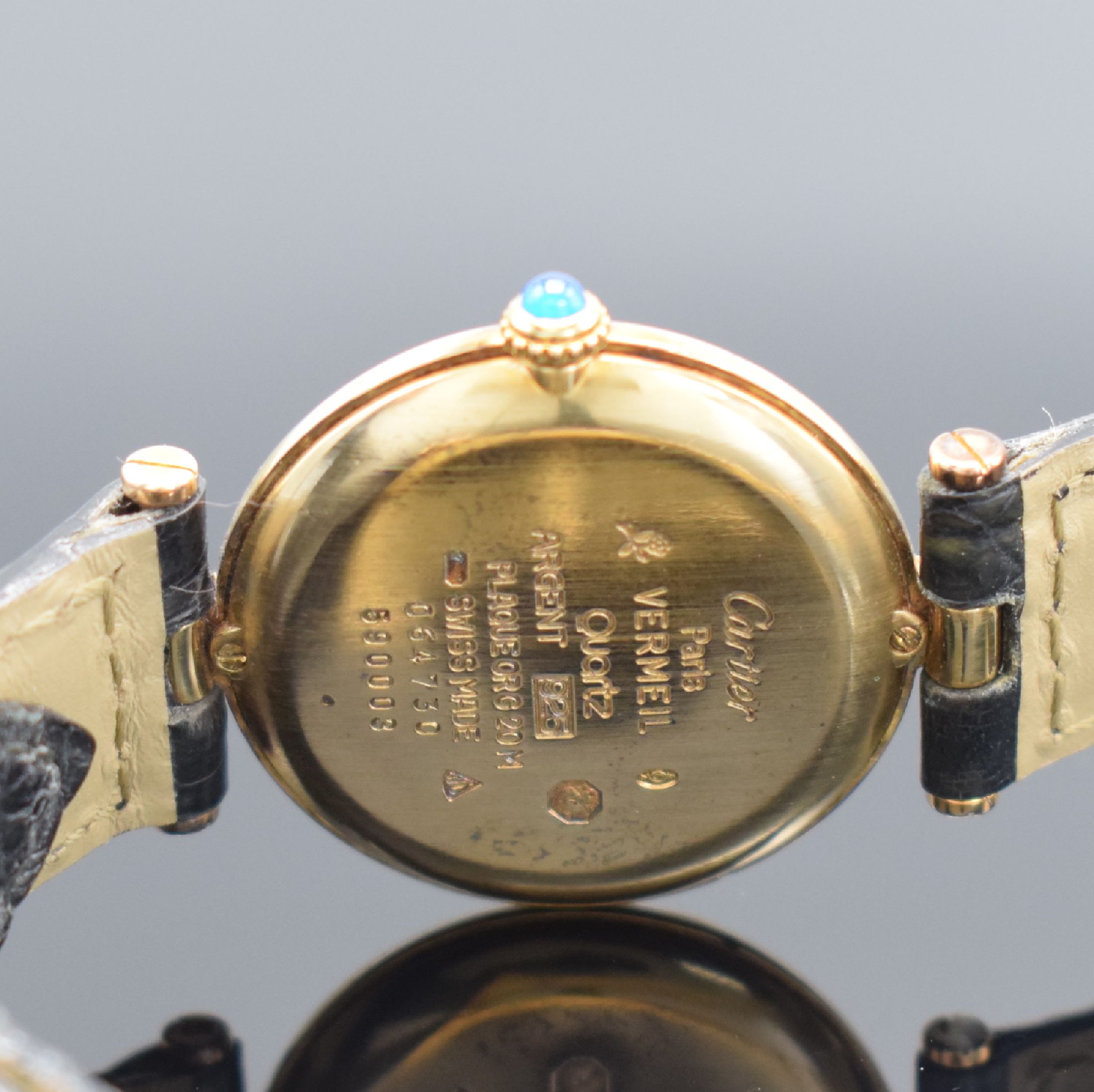 Detail c: CARTIER Paris Damenarmbanduhr Vermeil Referenz 590003, Schweiz um 1995, quarz, verg. Silbergehäuse inkl. Lederband m. verg. orig. Faltschl., gold. ...