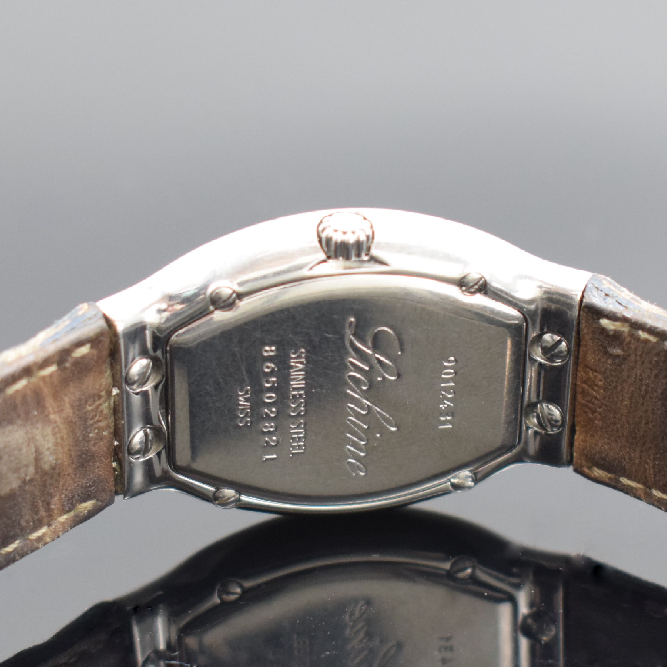 Detail d: EBEL Lichine Damenarmbanduhr in Edelstahl Referenz 9012431, Schweiz um 1999, quarz, tonneauförm. Geh., Boden verschr., orig. Lederband (zu ern.) m. ...