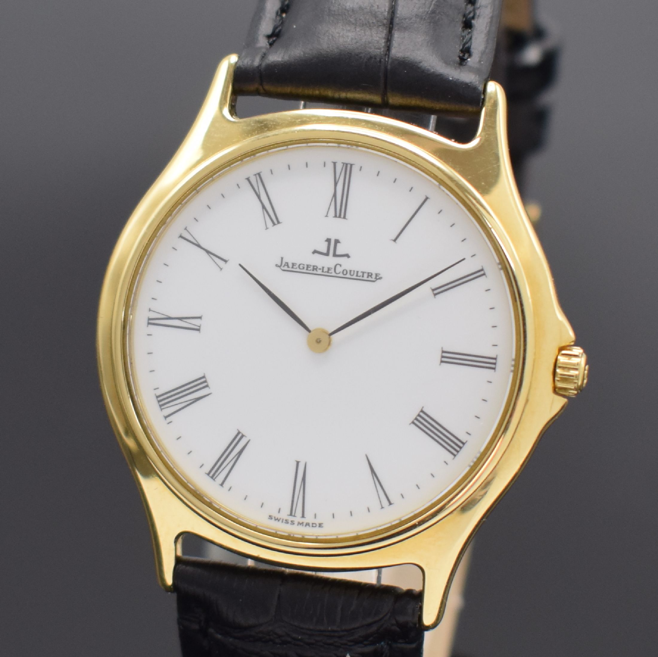 Detail a: Jaeger-LeCoultre Heraion Herrenarmbanduhr in GG 750/000 Referenz 112.1.08, Schweiz um 1990, Boden 4-fach verschr., Saphirflachglas, emailfarb. ...