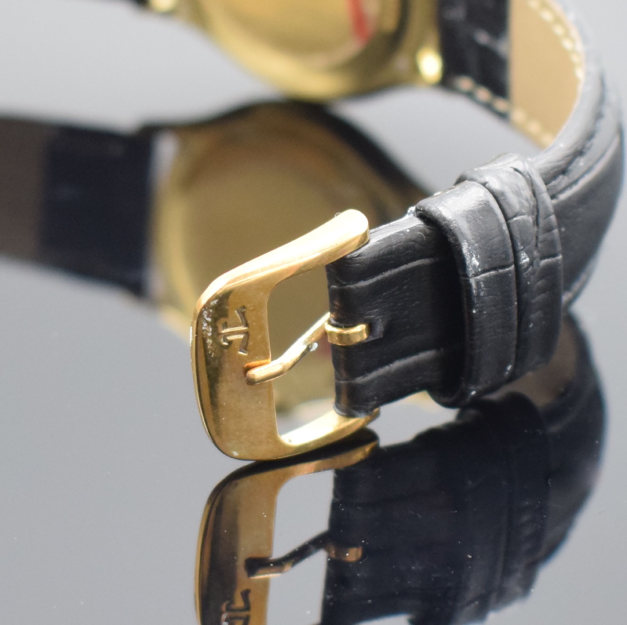 Detail b: Jaeger-LeCoultre Heraion Herrenarmbanduhr in GG 750/000 Referenz 112.1.08, Schweiz um 1990, Boden 4-fach verschr., Saphirflachglas, emailfarb. ...
