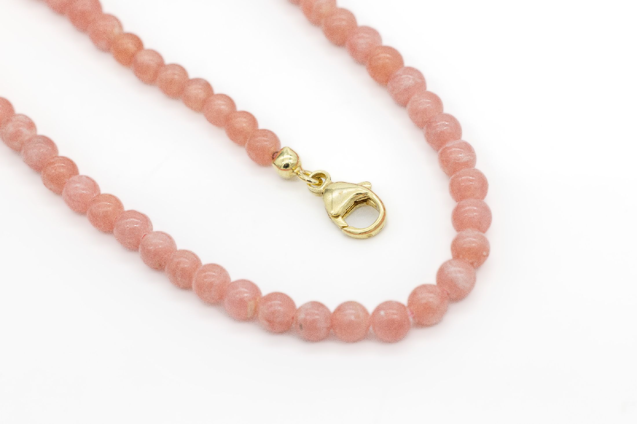 Rhodochrosit-Collier, schöne Rhodochrosit -Kugeln, D. ca. 5 - 5.5 mm, L. ca. 46 cm, Karabinerschließe verg.