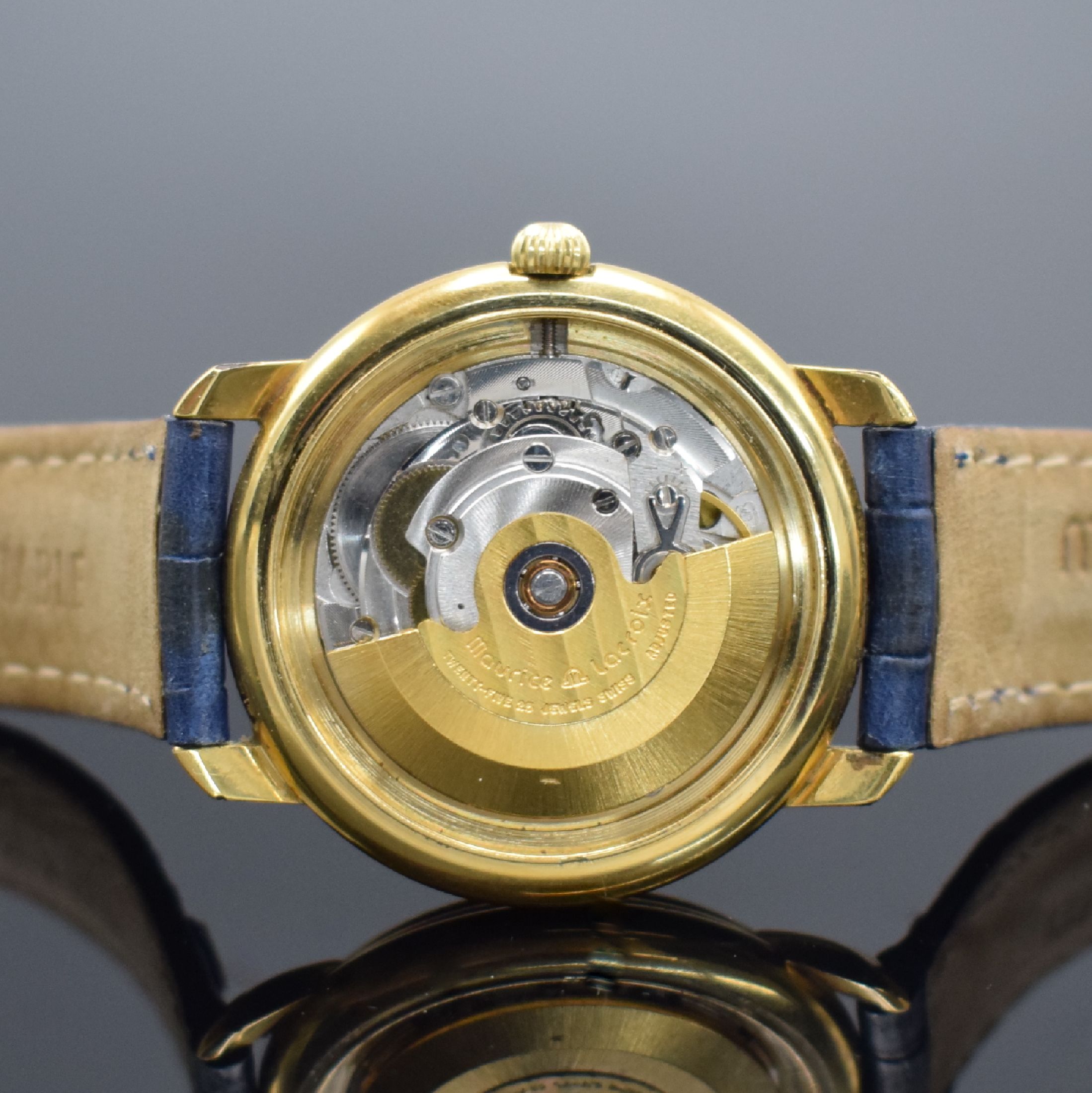 Detail d: MAURICE LACROIX vergoldete Herrenarmbanduhr Referenz 09329, Schweiz um 1990, Automatik, Stahlboden aufgedr., orig Lederband m. Dornschl., silb. ...