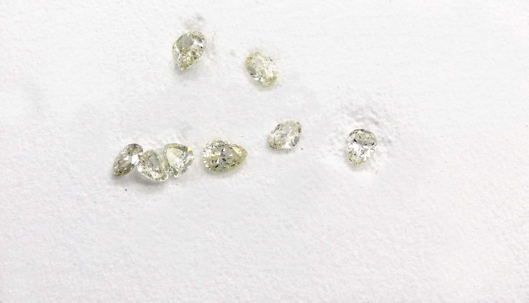 Detail a: Lot 8 Diamant-Tropfen zus. ca. 1.35 ct get. (yellow)/si-p 1