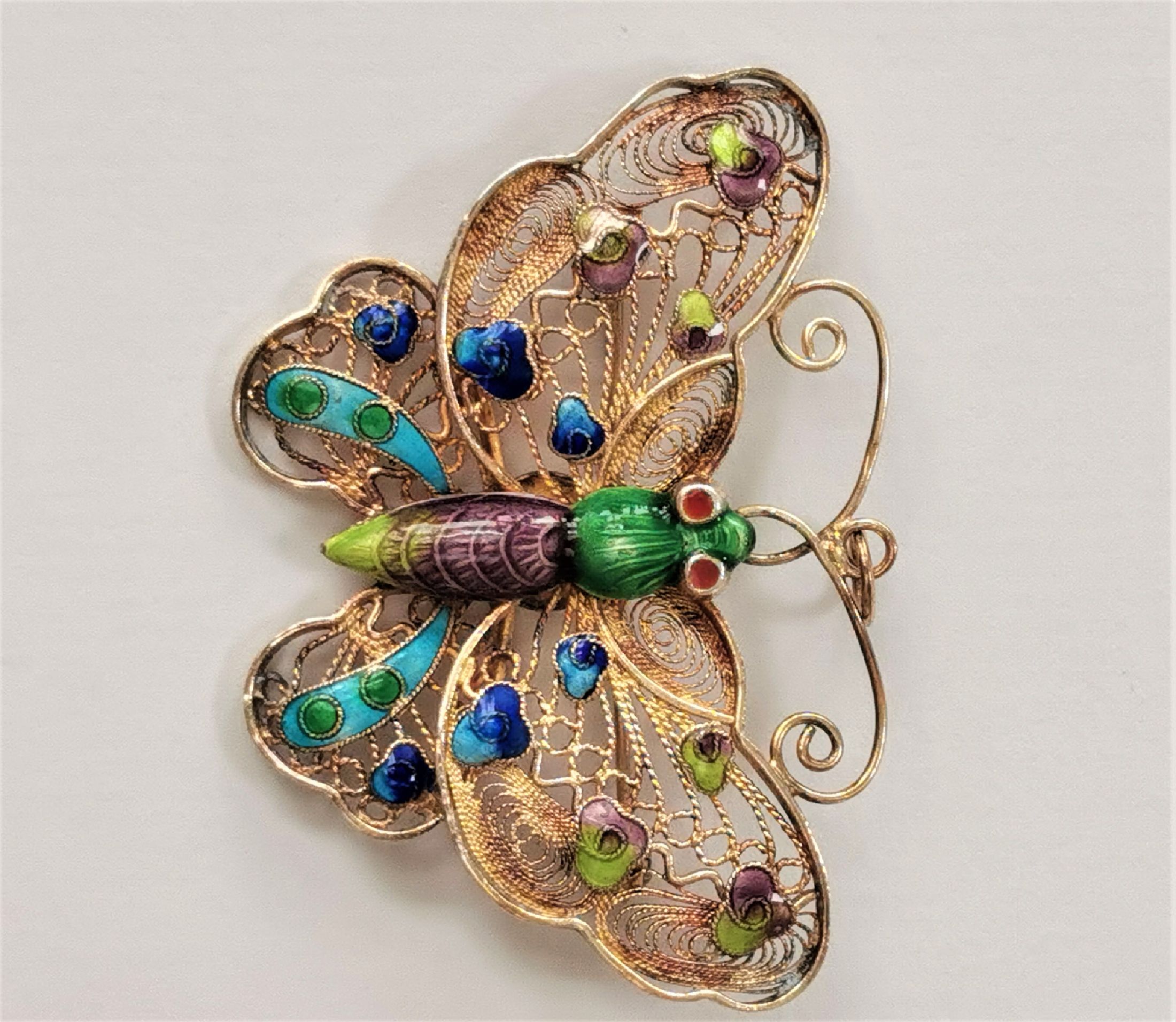 Detail e: Brosche "Schmetterling"", Silber vergoldet, um 1905, Filigranarbeit, partiell bunt emailliert, B. ca. 5.5 cm