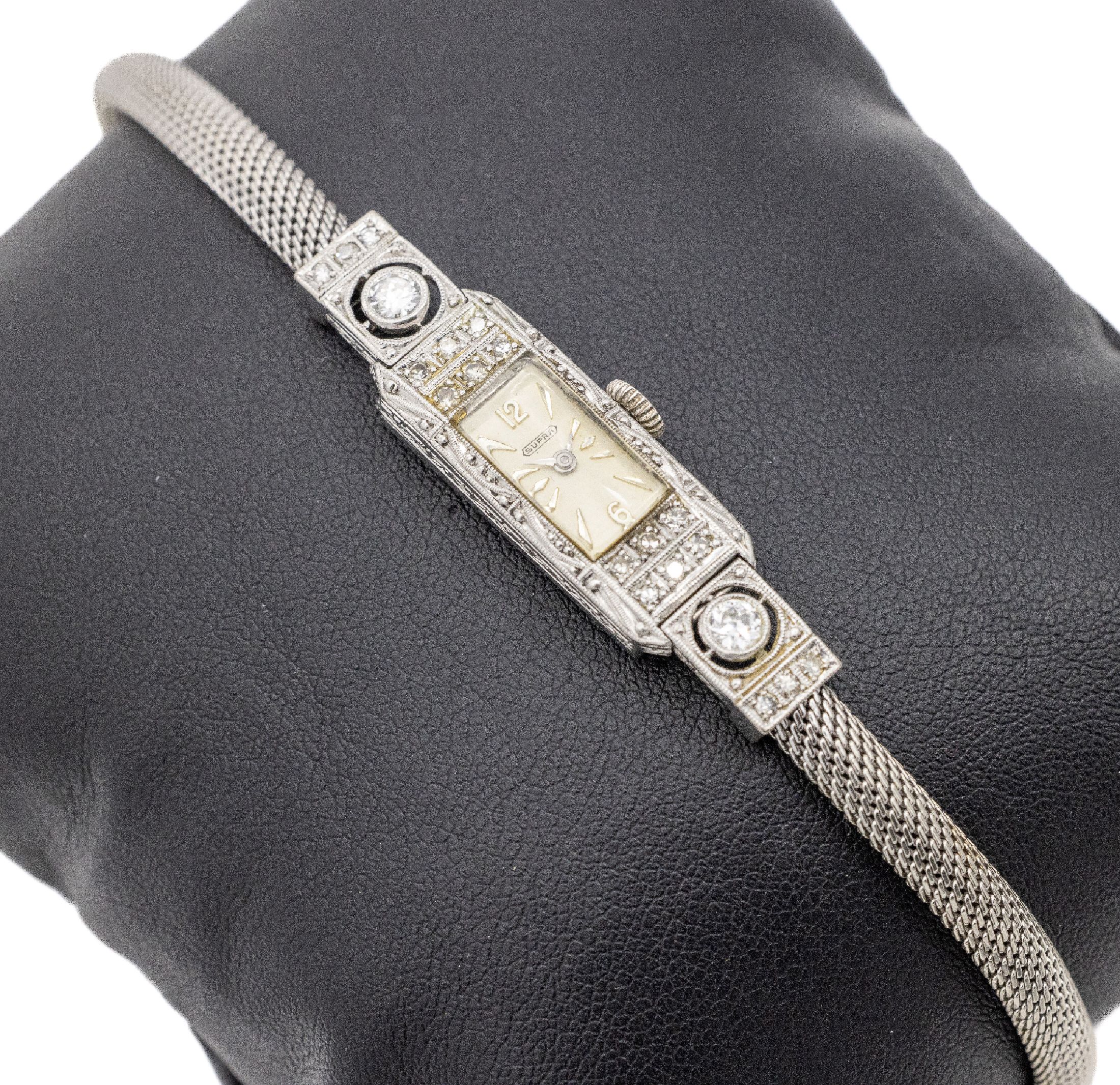 Platin Art-Deco Diamant-Uhr, um 1925, Band WG 585/000, Diamanten zus. ca. 0.55 ct Weiß/si-p, Handaufzug, Funktion ungeprüft, L. ca. 19 cm