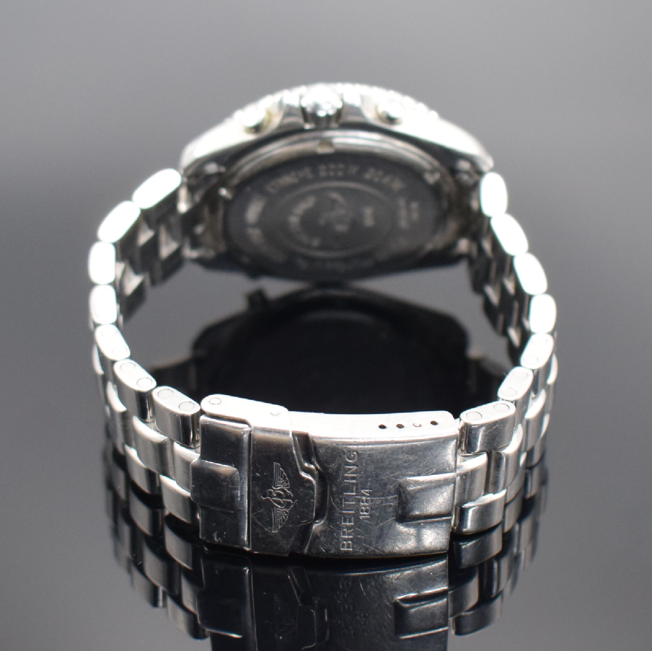 Detail b: BREITLING New Pluton Herrenarmbanduhr in Stahl Referenz A51038, Schweiz 1990er Jahre, quarz, Boden & Krone verschr., orig. Stahlband m. Faltschl., ...
