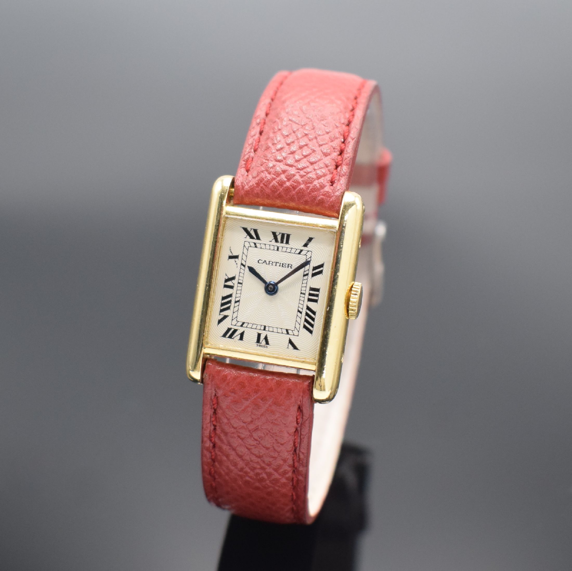 CARTIER Tank Damenarmbanduhr in GG 750/000, Schweiz um 1980, Handaufzug, rechteck. Geh., seitl. 4-fach verschr., Krone später, versilb. ...