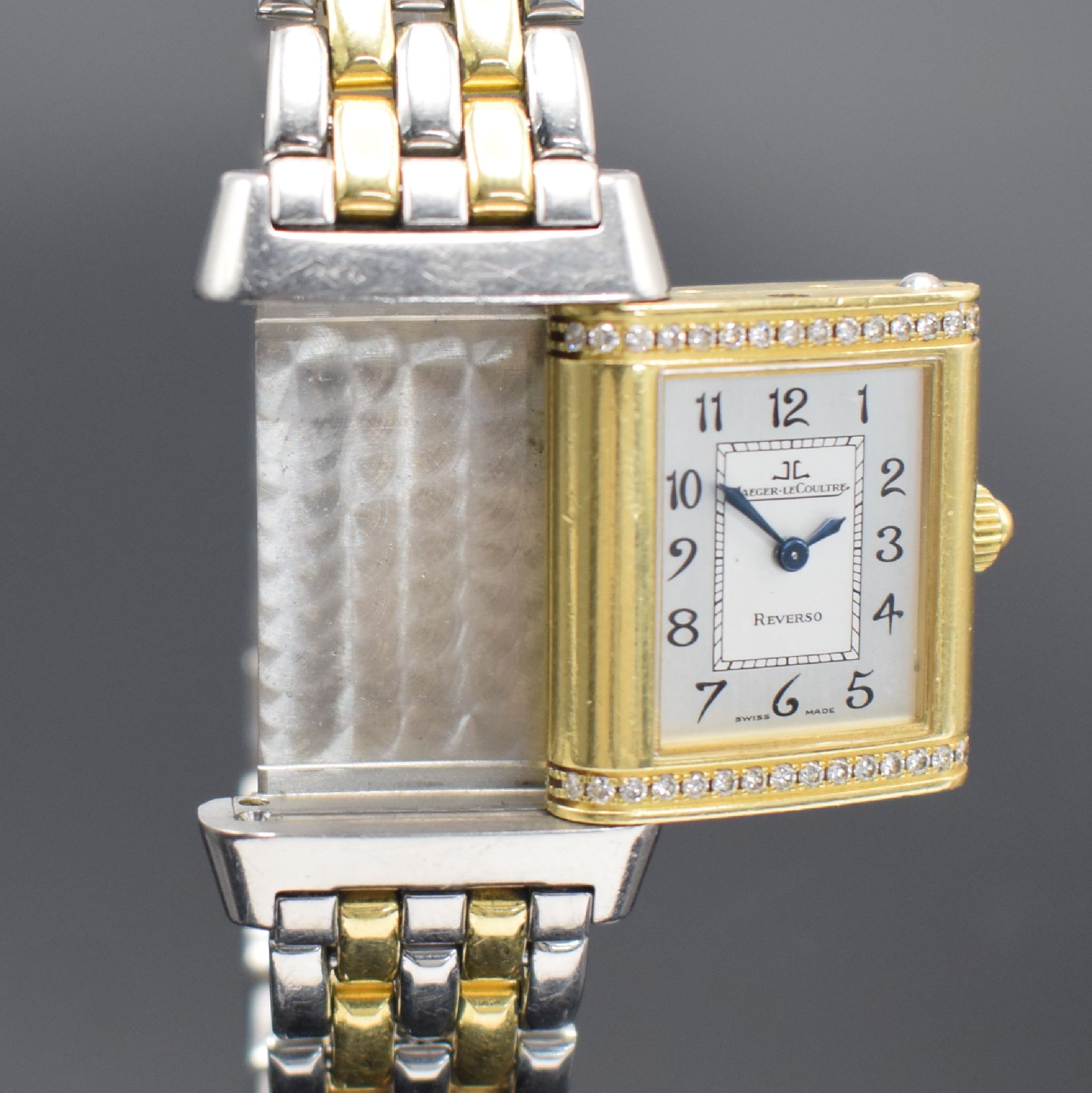 Detail c: Jaeger-LeCoultre Reverso Damenarmbanduhr in Stahl/Gold mit Diamanten Referenz 265.5.08, Schweiz um 2005, quarz, um 180 Grad drehb. Wendegeh. in GG ...