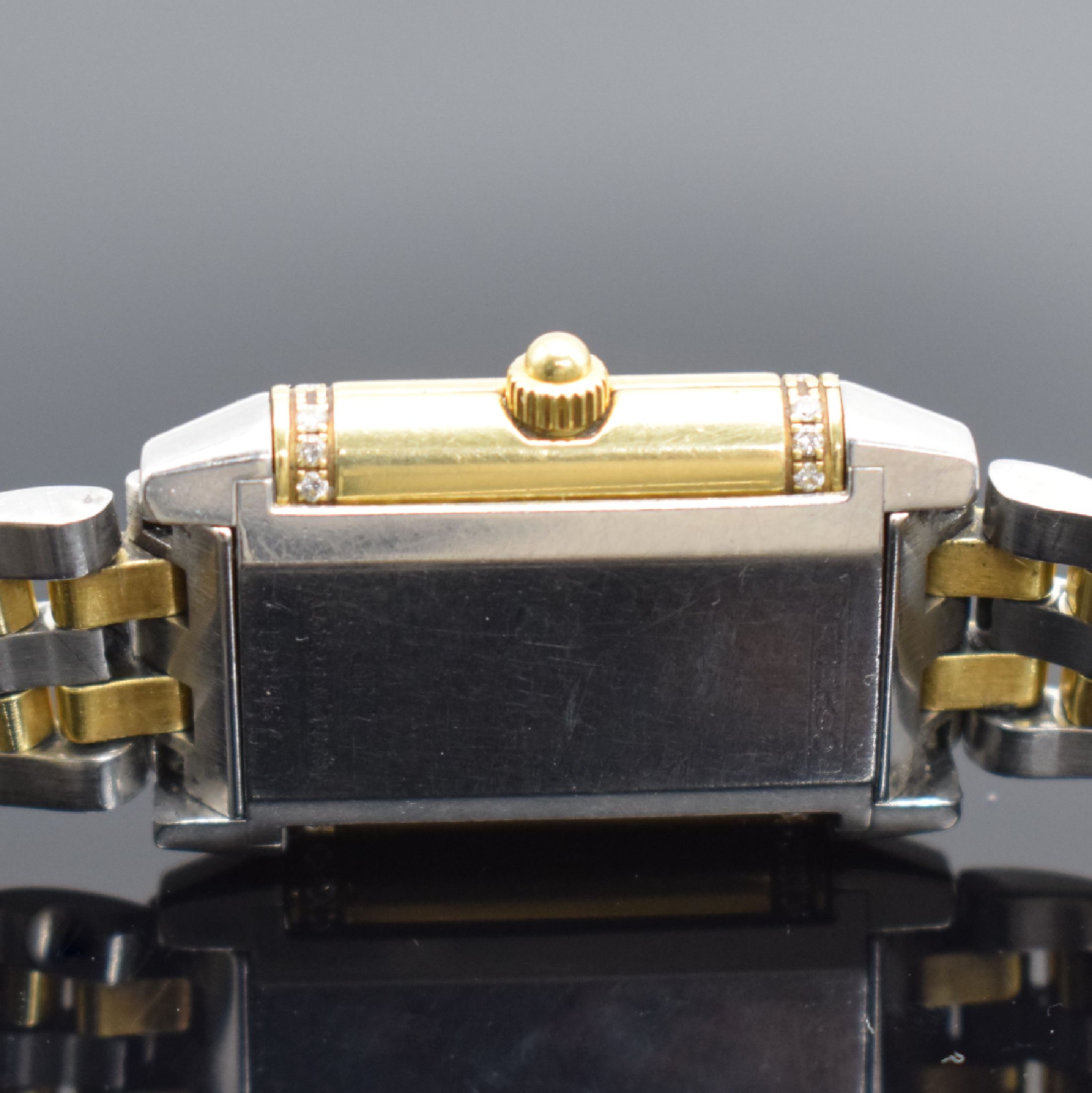 Detail e: Jaeger-LeCoultre Reverso Damenarmbanduhr in Stahl/Gold mit Diamanten Referenz 265.5.08, Schweiz um 2005, quarz, um 180 Grad drehb. Wendegeh. in GG ...