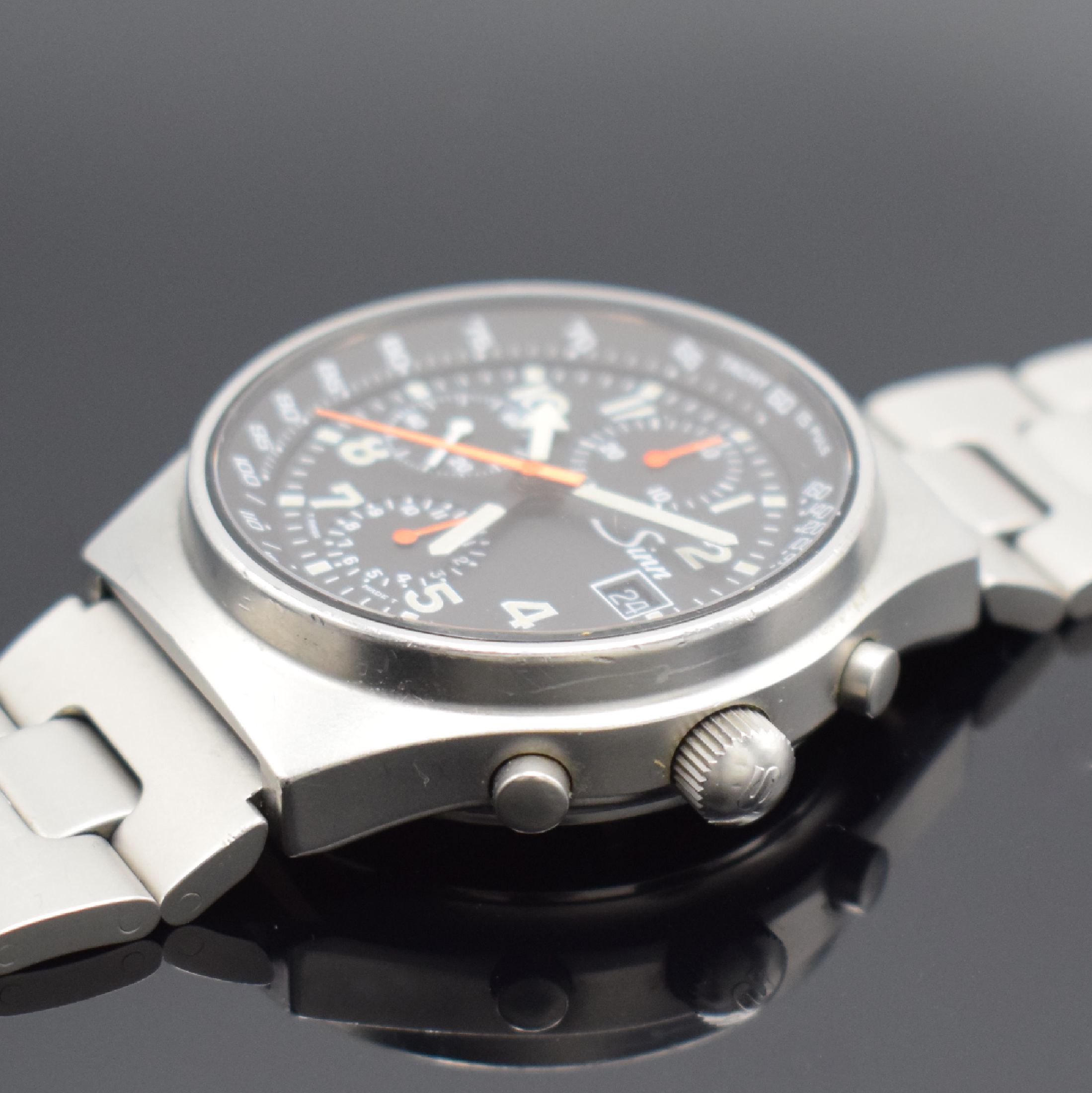 Detail c: SINN Armbandchronograph mit 2. Zeitzone Modell 144 GMT, Schweiz um 1995, Automatik, matt. Edelstahlgeh. inkl. Gliederband m. Faltschl., beids. ...