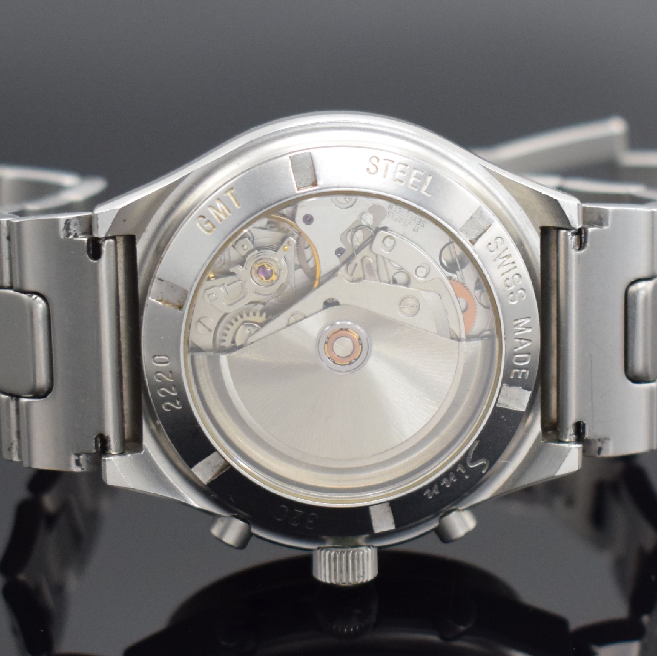 Detail e: SINN Armbandchronograph mit 2. Zeitzone Modell 144 GMT, Schweiz um 1995, Automatik, matt. Edelstahlgeh. inkl. Gliederband m. Faltschl., beids. ...