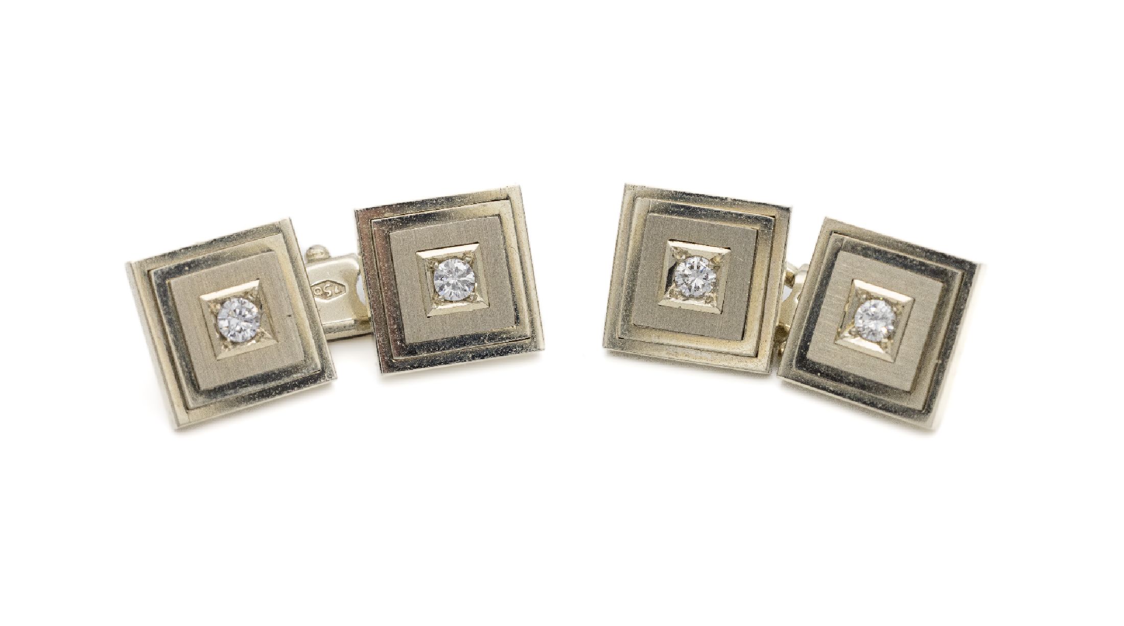 Paar 18 kt Gold Brillant-Manschettenknöpfe, WG 750/000, 4 Brillanten zus. ca. 0.40 ct Weiß/si, total ca. 13.8 g