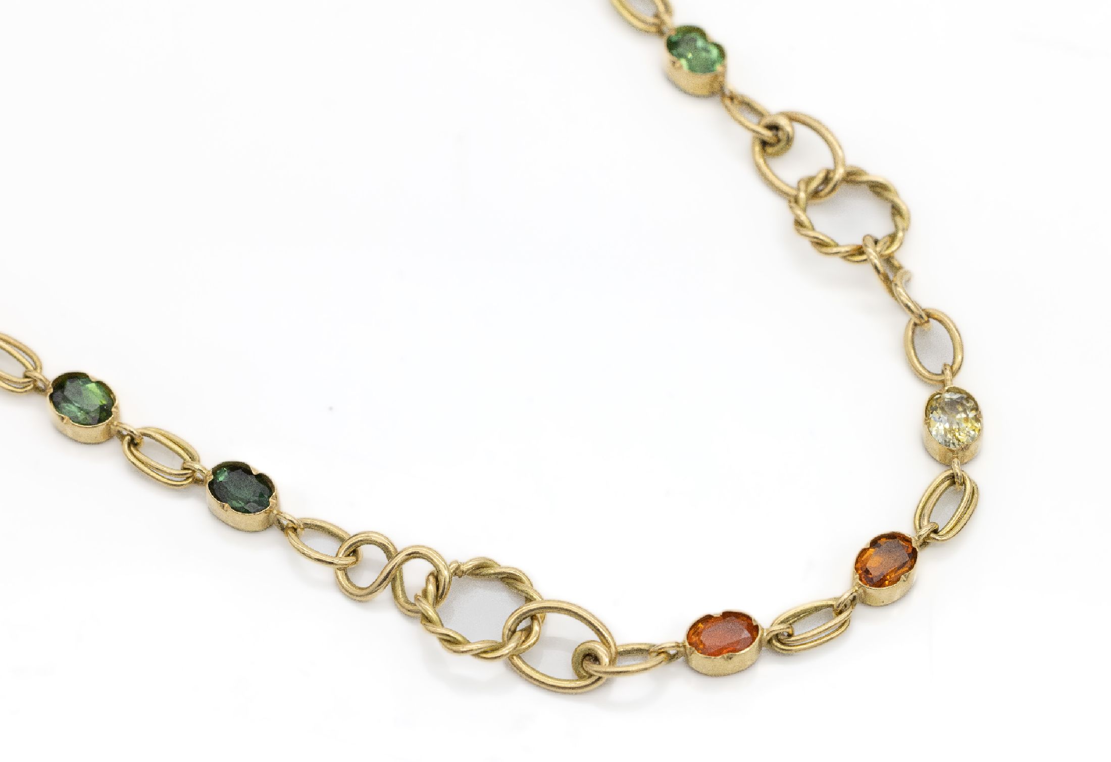 18 kt Gold Farbstein-Collier, GG 750/000, ovalfacett. Farbsteine zus. ca. 18.0 ct, darunter Amethyst, Turmalin, Citrin, Aquamarin, total ca. 42.0 g, ...