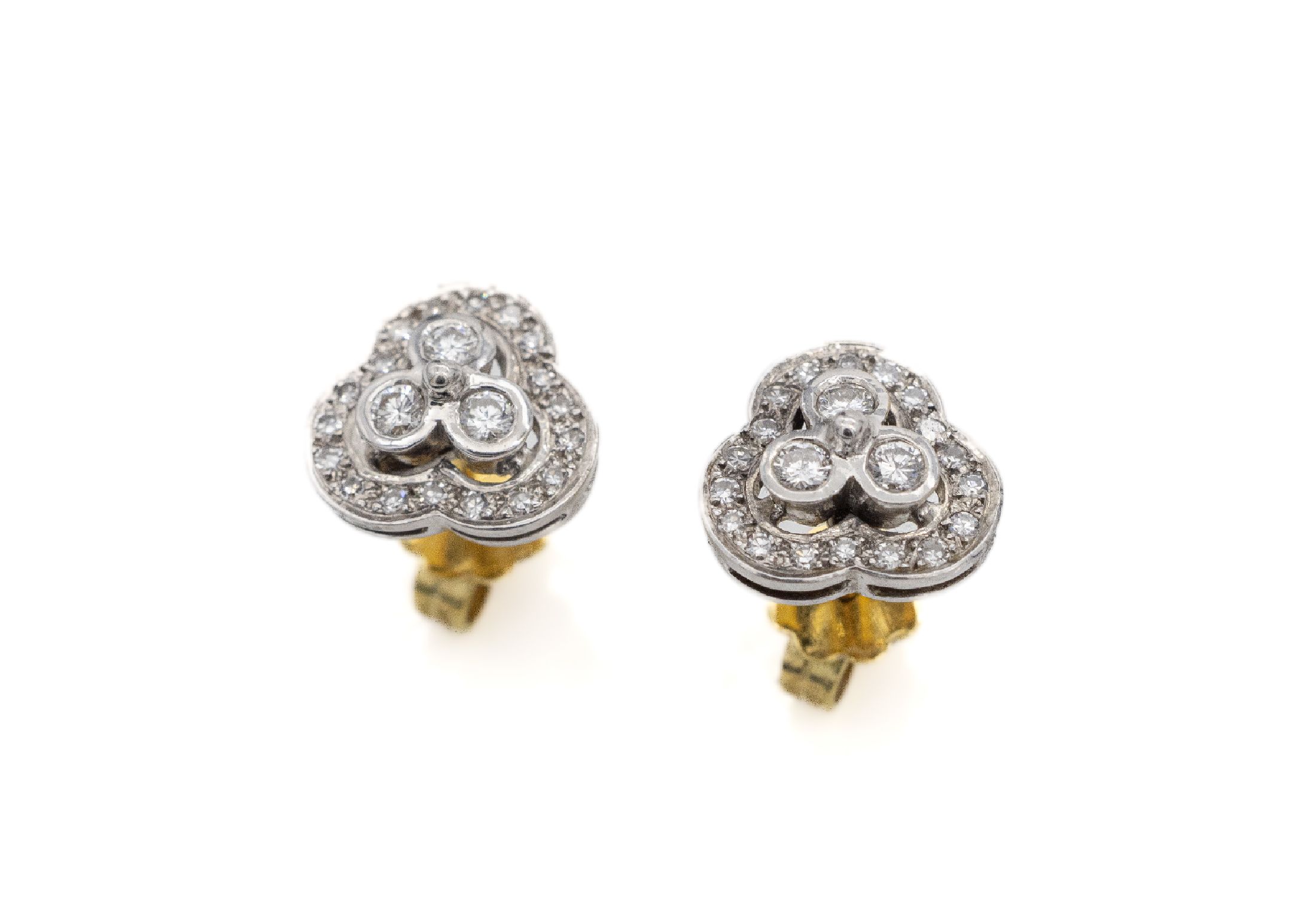 Paar 18 kt Gold Diamant-Ohrstecker, GG/WG 750/000, abstrakte Blütenform, z.T. in WG gearbeitet, Brillanten zus. ca. 1.10 ct Weiß/si, auf 2 Ebenen ...