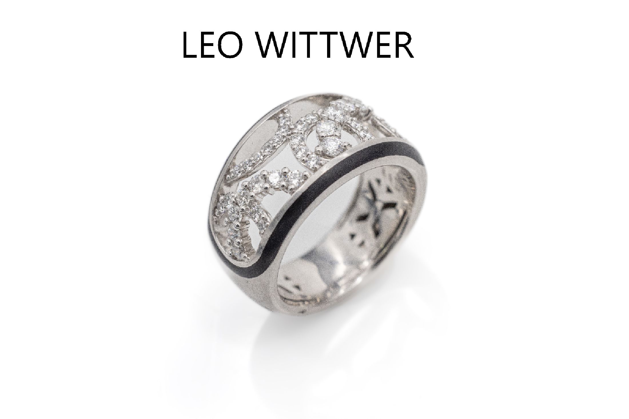 18 kt Gold LEO WITTWER Email-Brillant-Ring, WG 750/000, Oberfläche sat., mit schwarzem Mattemail, durchbrochen gearbeitet, Brillanten zus. ca. 0.75 ...