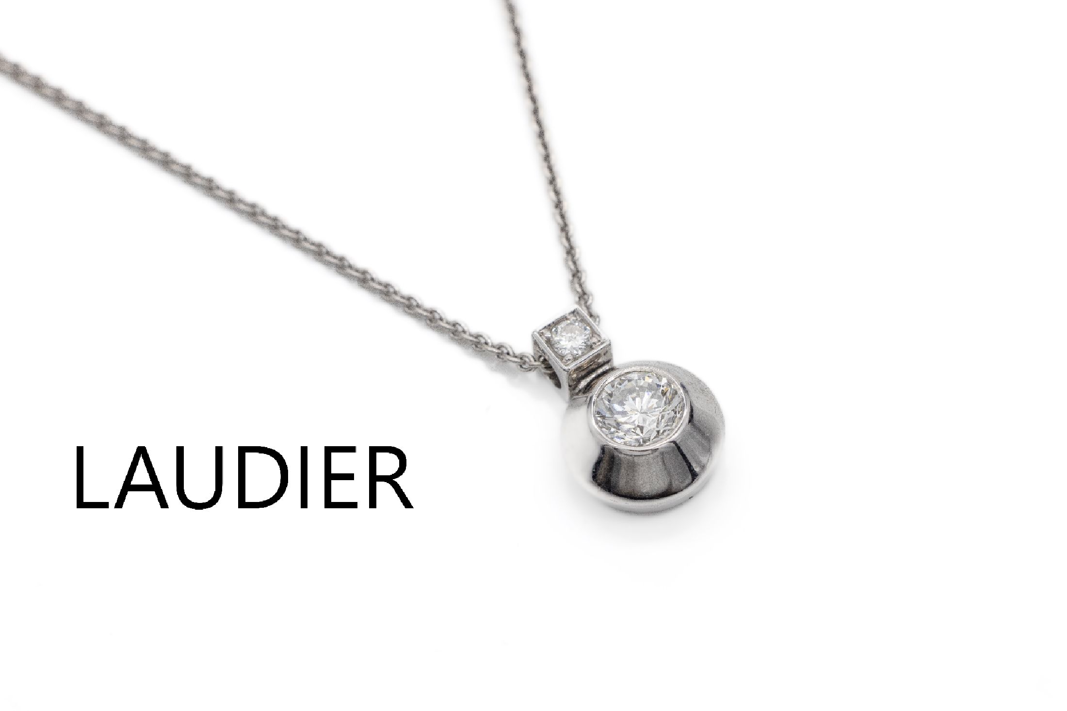 18 kt Gold LAUDIER Brillant-Collier, WG 750/000, 2 Brillanten zus. ca. 1.11 ct feines Weiß/vs, sign., Steingewicht grav., an Kette, L. ca. 40 cm, ...