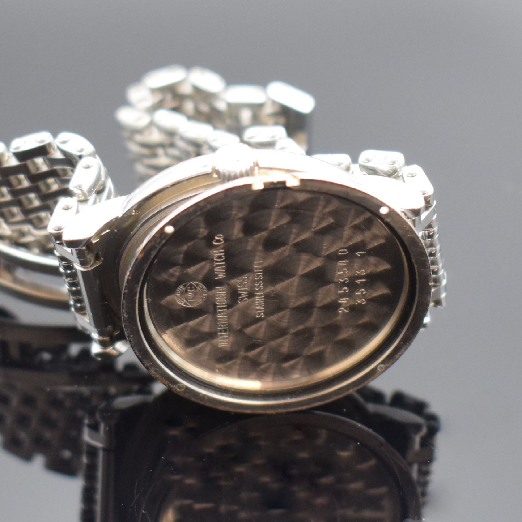Detail f: IWC Portofino Herrenarmbanduhr Ref. 3513 1, Schweiz um 1995, Automatik, Edelstahlgeh., Boden geschr., unsign. Gliederband m. dopp. Faltschl., Boden ...