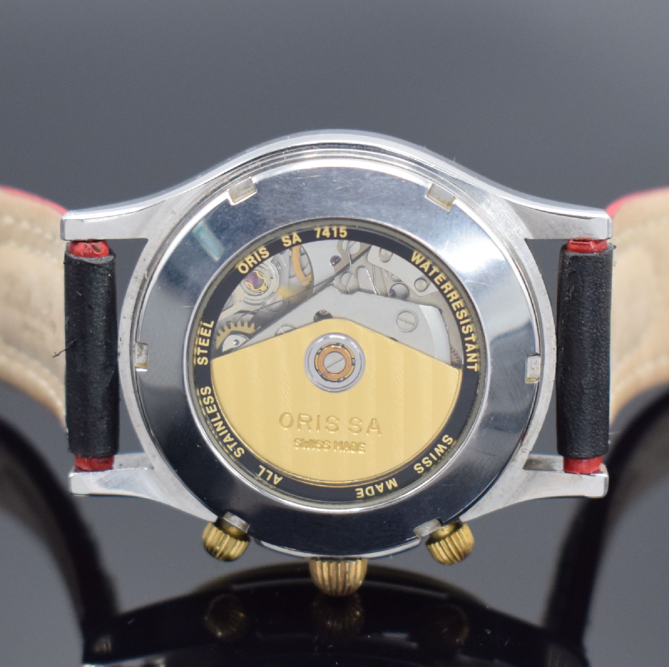 Detail d: ORIS Herrenarmbanduhr mit Chronograph, Schweiz um 1993, Automatik, Edelstahlgeh. teils verg., Boden geschr., silb. Zifferbl. m. aufges. Std.-Ind., ...
