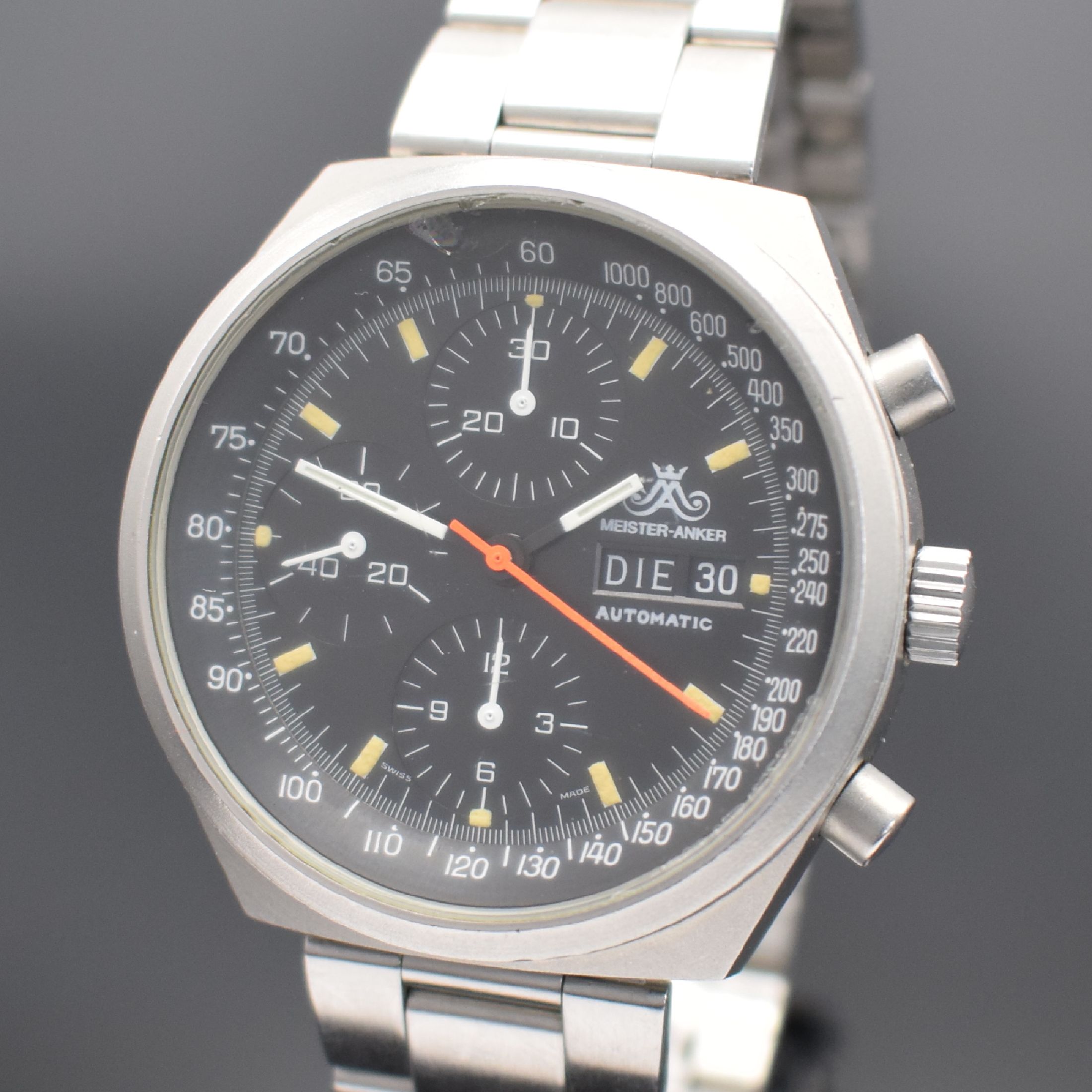 Detail a: MEISTER-ANKER Herrenchronograph in Stahl, Schweiz um 1980, Automatik, mattiertes Geh., Boden verschr., Mineralglas besch., schwarzes Zifferbl., ...