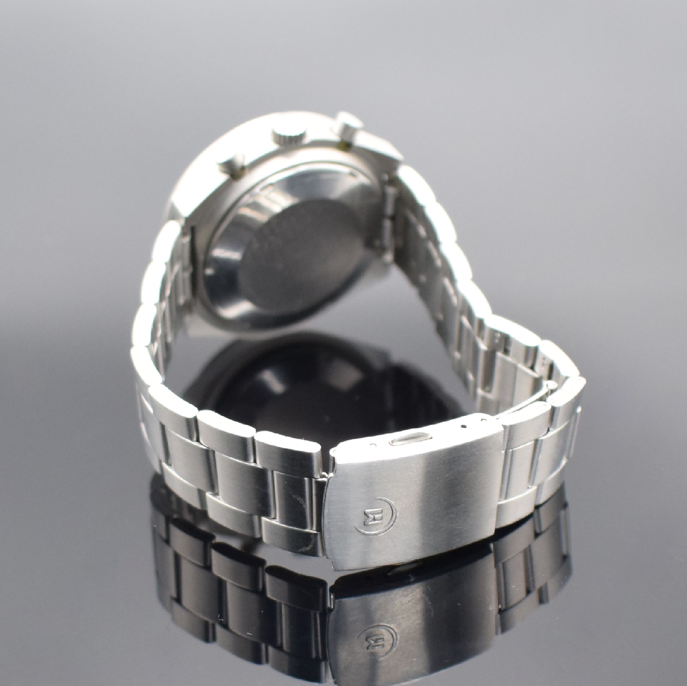 Detail b: MEISTER-ANKER Herrenchronograph in Stahl, Schweiz um 1980, Automatik, mattiertes Geh., Boden verschr., Mineralglas besch., schwarzes Zifferbl., ...