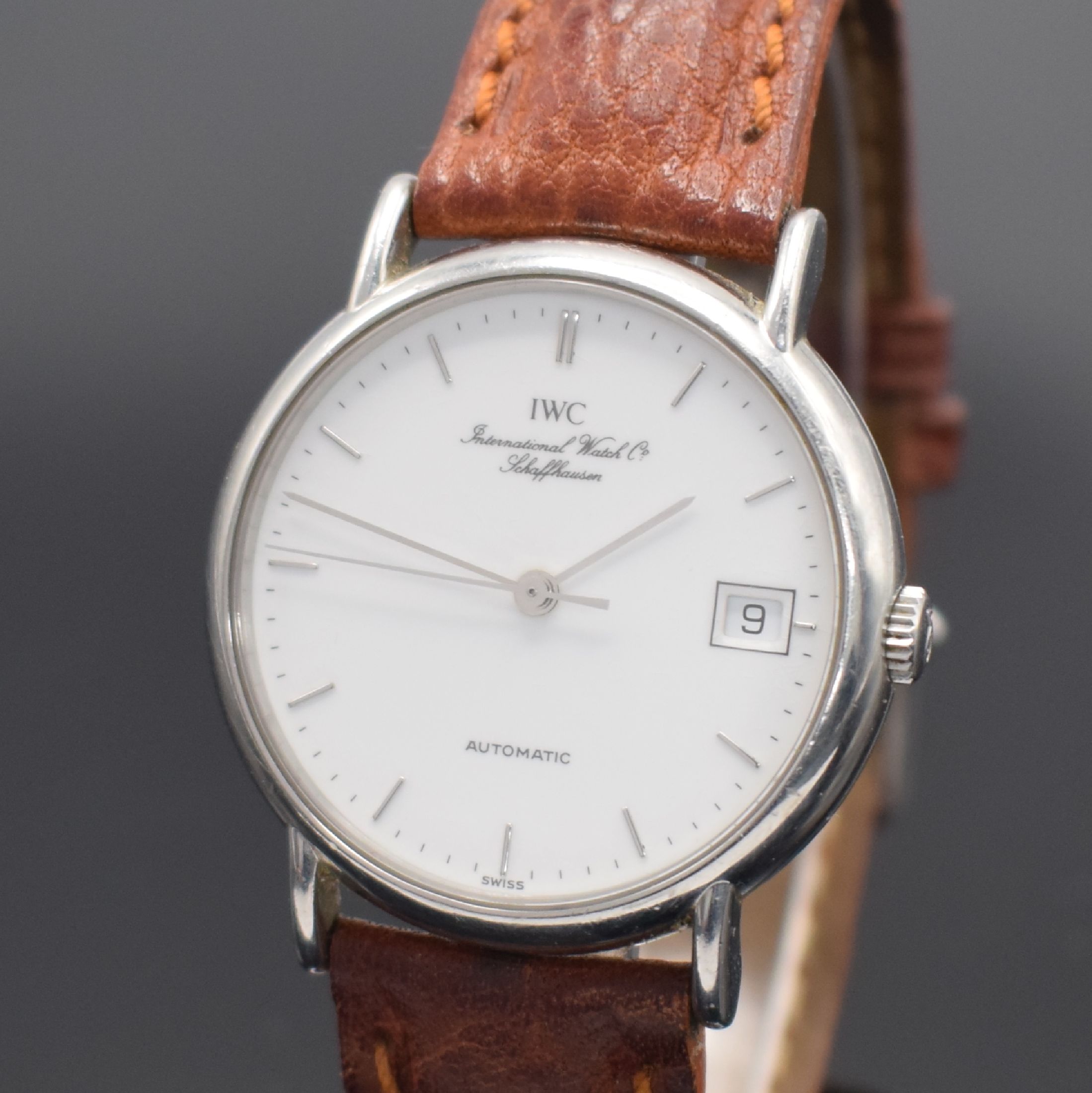 Detail a: IWC Portofino Herrenarmbanduhr in Stahl Referenz 3513 1, Schweiz um 1990, Automatik, 4-fach verschr. Geh., weißes Zifferbl., silb. Indizes & Zeiger, ...