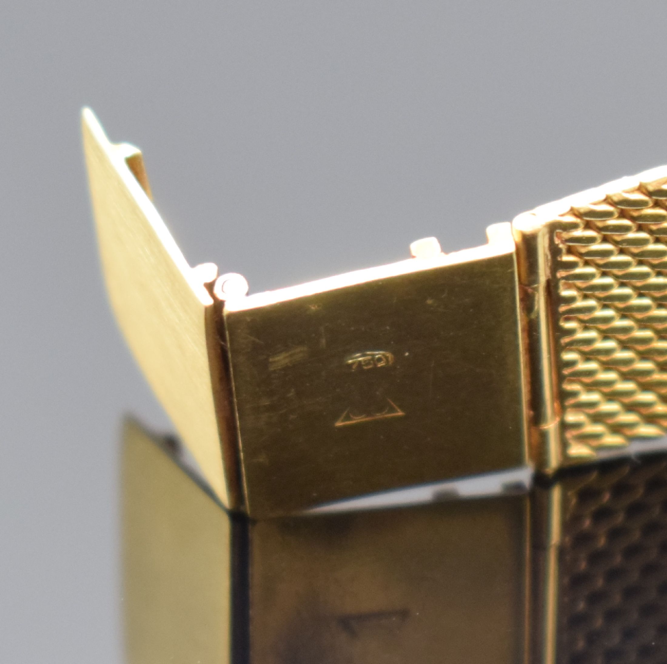 Detail b: CORUM elegante Armbanduhr in GG 750/000, Schweiz um 1960, Handaufzug, 3-tlg. Geh., Boden & Glasrand aufgedr., anges. Milanaiseband, orig. Krone, ...