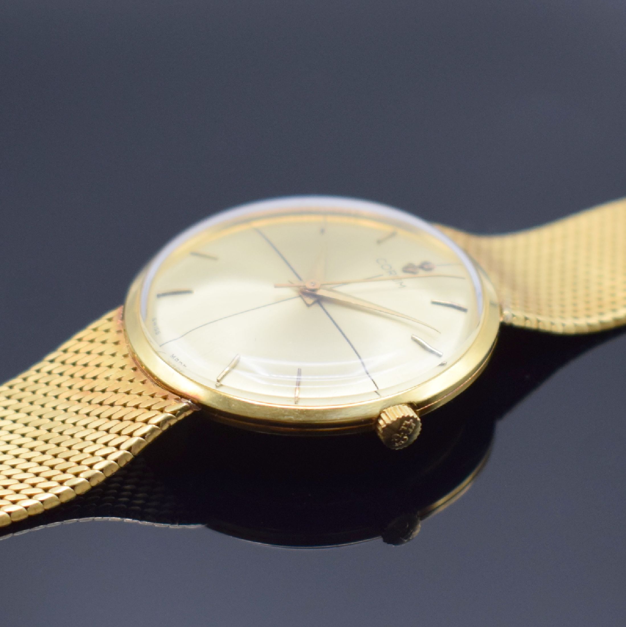 Detail c: CORUM elegante Armbanduhr in GG 750/000, Schweiz um 1960, Handaufzug, 3-tlg. Geh., Boden & Glasrand aufgedr., anges. Milanaiseband, orig. Krone, ...