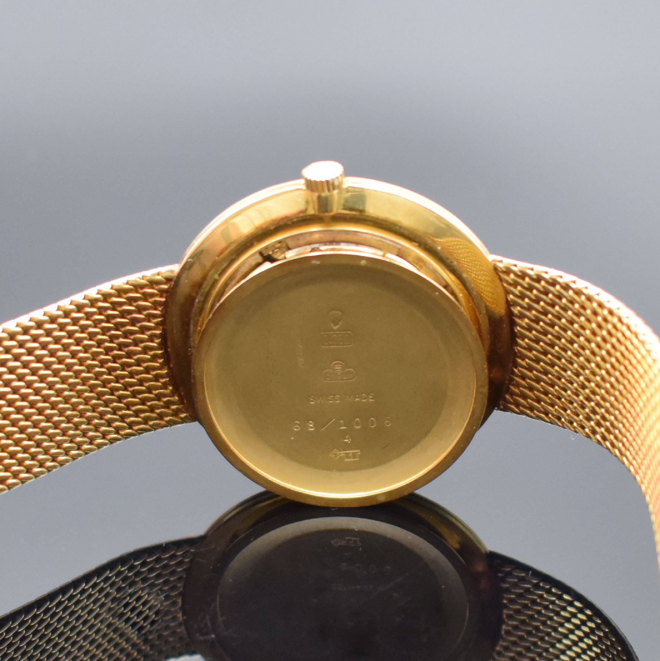 Detail f: CORUM elegante Armbanduhr in GG 750/000, Schweiz um 1960, Handaufzug, 3-tlg. Geh., Boden & Glasrand aufgedr., anges. Milanaiseband, orig. Krone, ...