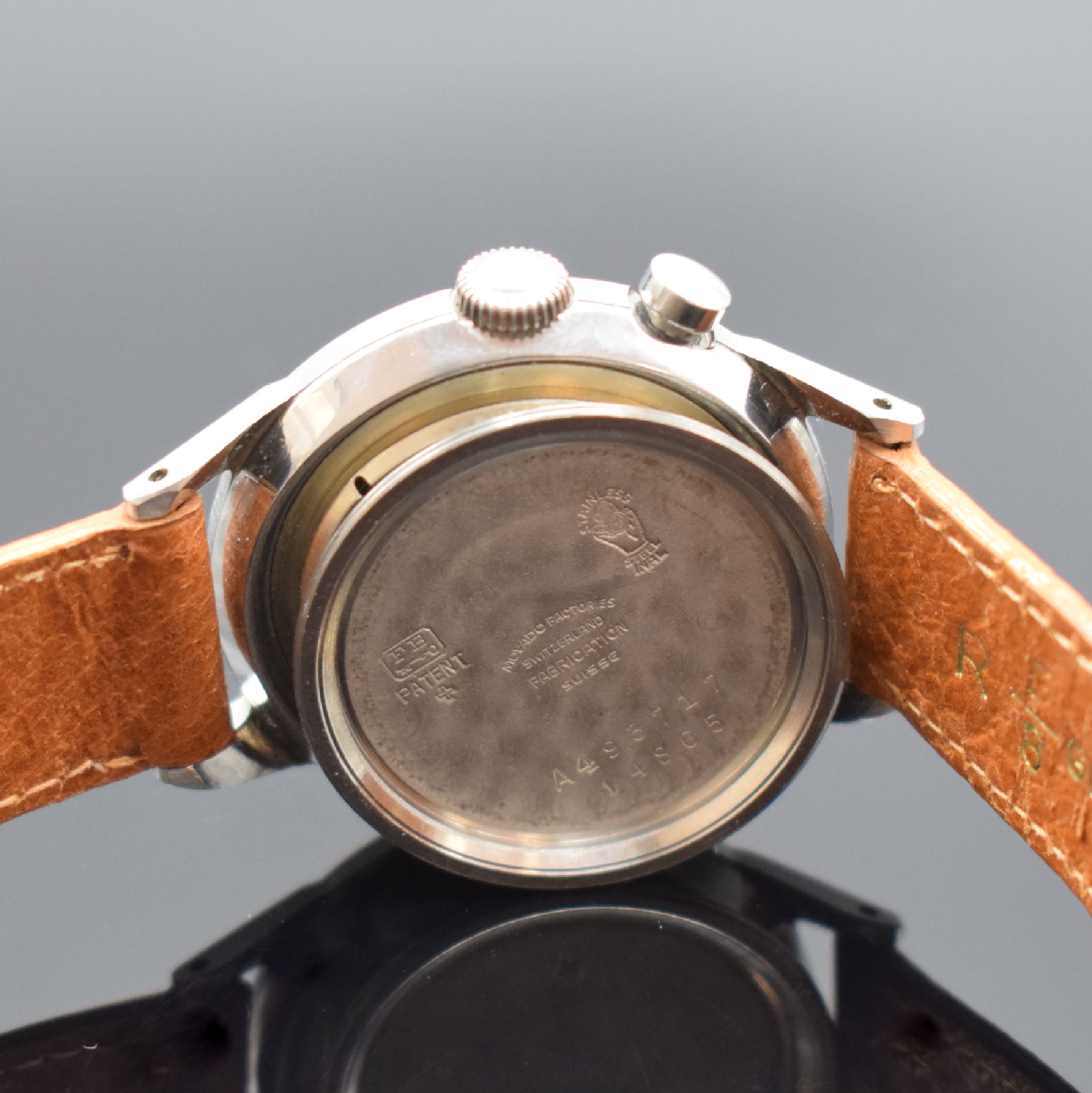 Detail e: MOVADO Chronostop seltener Armbandchronograph in Stahl, Schweiz um 1945, Handaufzug, verschr. Borgel-Gehäuse, silb. Zifferbl. m. Radium-Schatten, ...