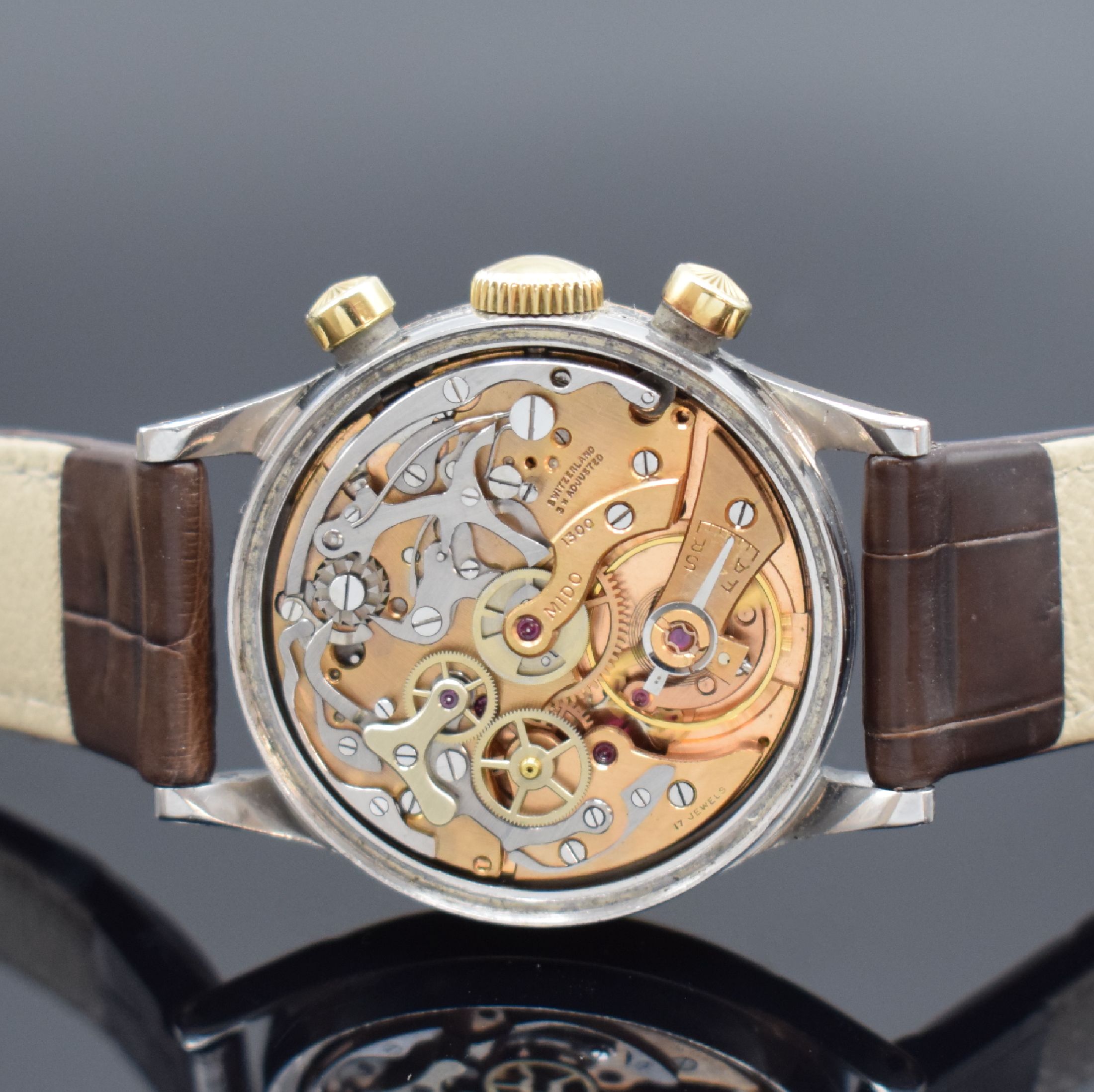 Detail e: MIDO Multi-Centerchrono seltener Armbandchronograph in Stahl/Gold, Schweiz um 1950, Handaufzug, verschr. Geh. m. starker Goldhaube, orig. Krone & ...