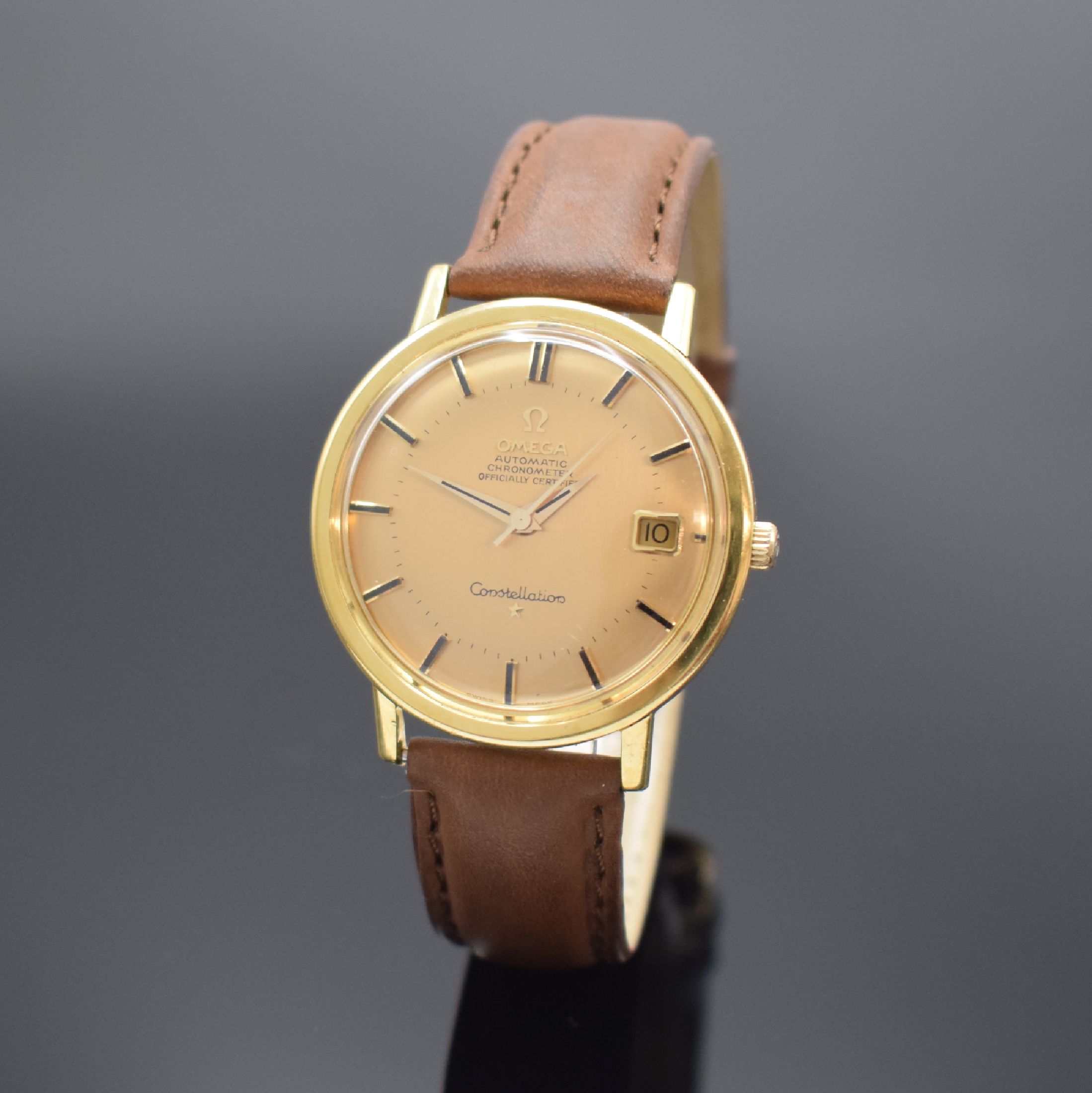 OMEGA Constellation Armbandchronometer in GG 750/000 mit Goldzifferblatt Referenz 168004/14, Schweiz um 1969, Automatik, verschr. Geh., rücks. ...