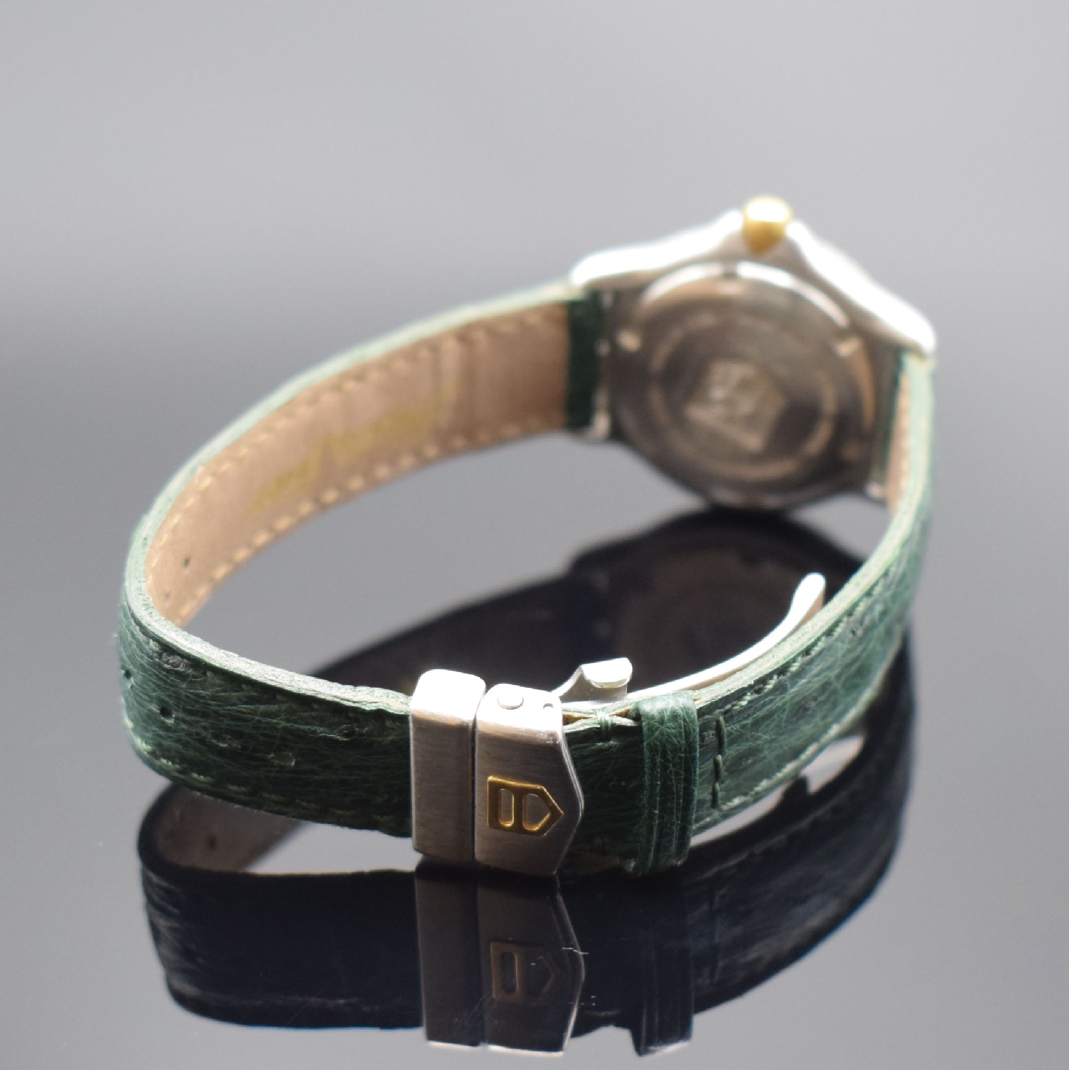 Detail b: TAG HEUER Damen-Sportuhr in Stahl/Gold Referenz WI 1351, Schweiz um 2000, quartz, verschr. Geh., eins. drehbare Lünette m. 60er-Tlg., gold. ...