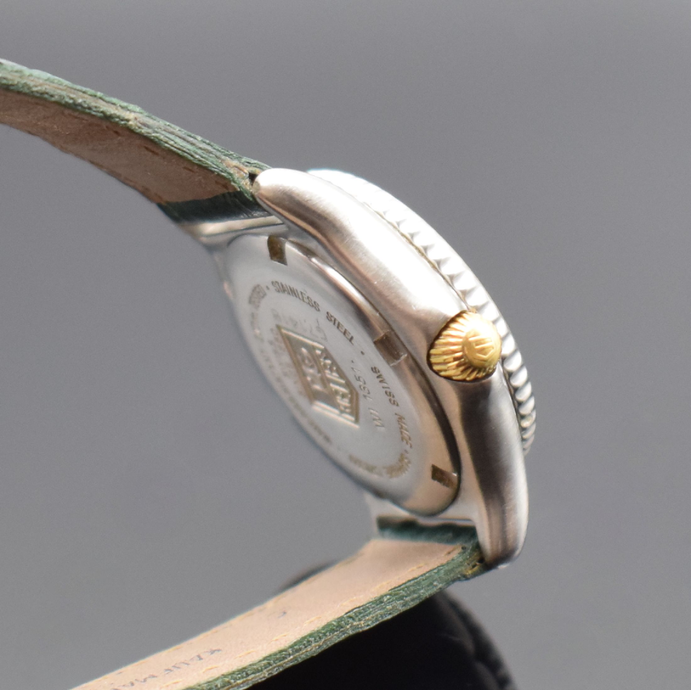 Detail c: TAG HEUER Damen-Sportuhr in Stahl/Gold Referenz WI 1351, Schweiz um 2000, quartz, verschr. Geh., eins. drehbare Lünette m. 60er-Tlg., gold. ...