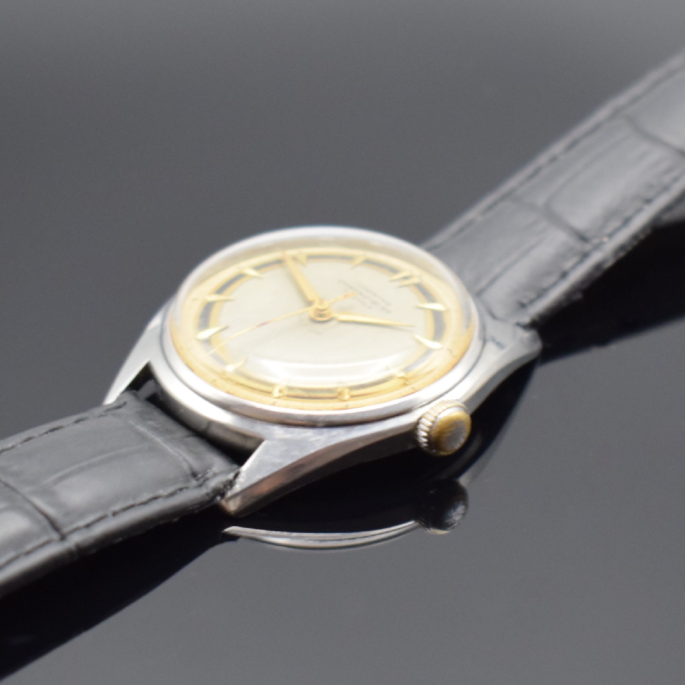 Detail b: JUNGHANS Chronometer Kaliber 82/1 in Stahl, Deutschland um 1954, Handaufzug, verschr. Geh., Krone später, grau/schwarz/silb. Zifferbl. fl., gold. ...