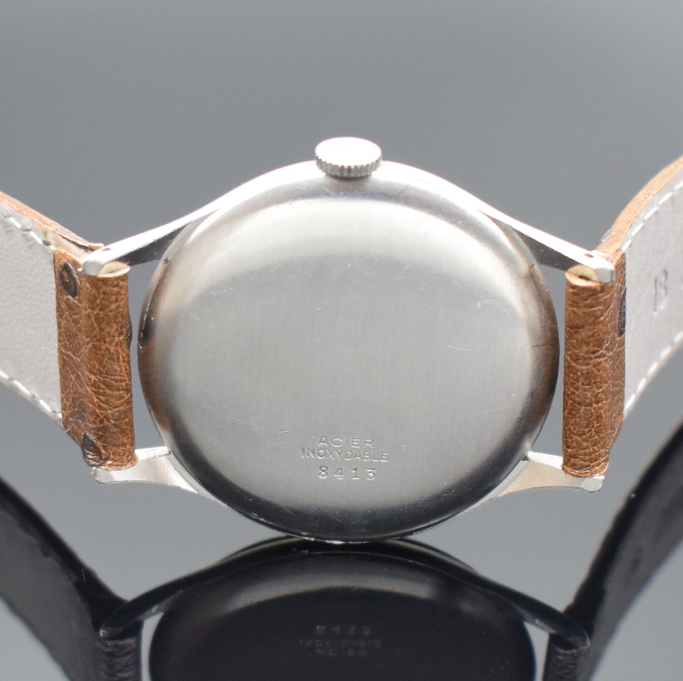 Detail c: CORTEBERT Chronometre sehr seltenes Armbandchronometer in Stahl, Schweiz um 1945, Handaufzug, 3-tlg. Geh., Boden & Glasrand aufgedr., Lachsfarb. ...