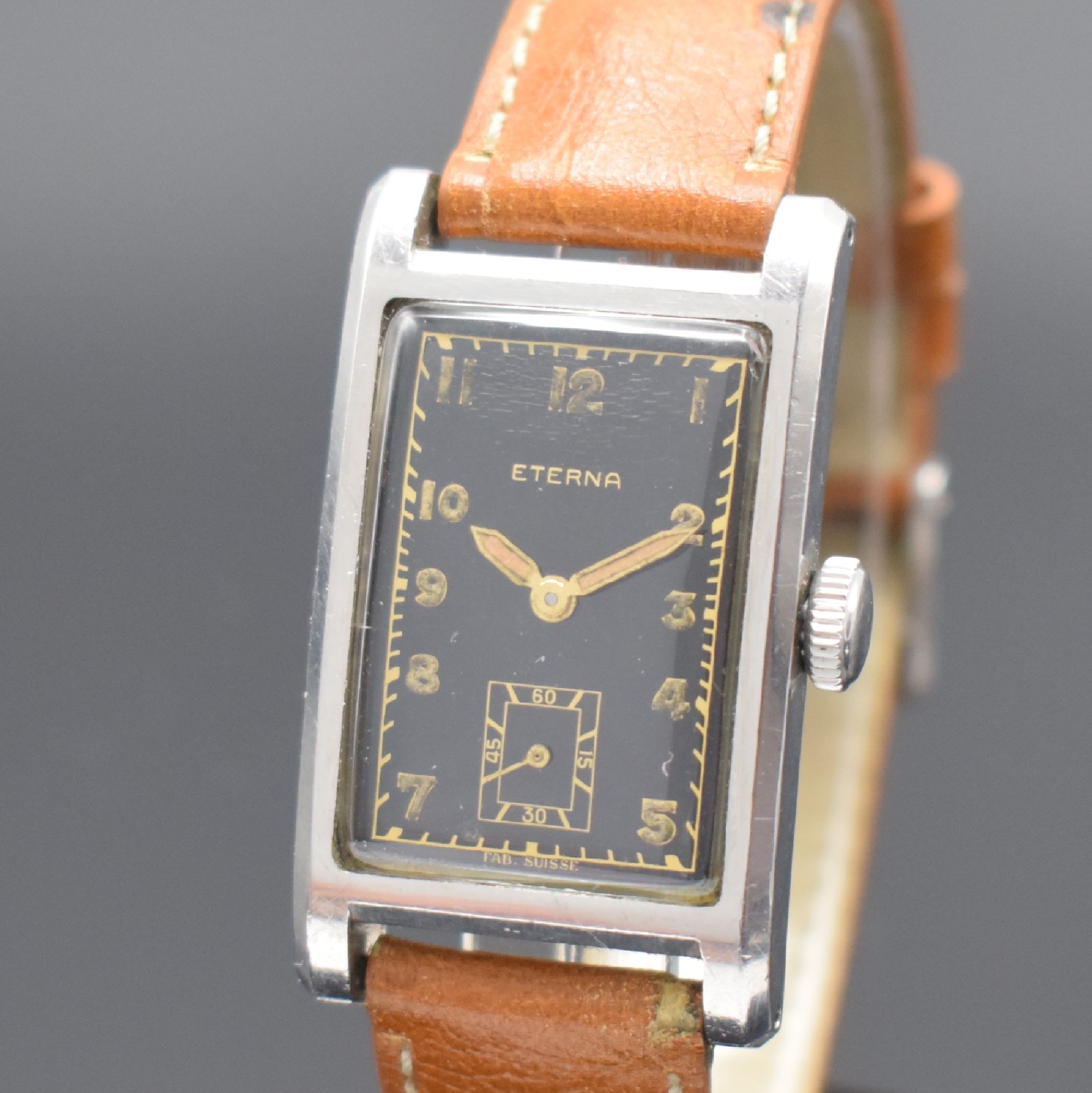 Detail a: ETERNA seltene rechteckige Armbanduhr mit verschraubtem Boden in Stahl, Schweiz um 1940, Handaufzug, 2-tlg. Geh., Boden 4-fach verschr., schwarzes ...