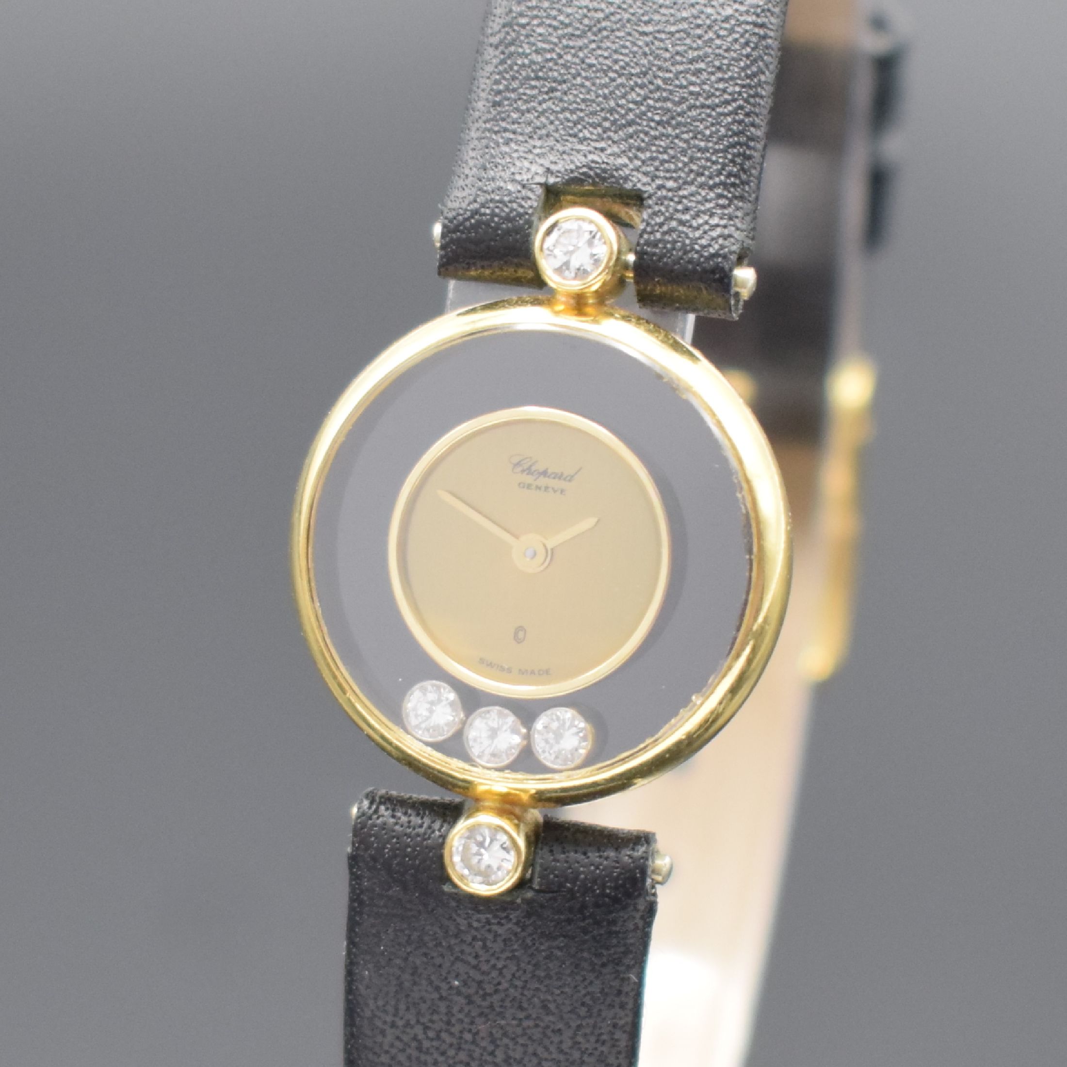 Detail a: Chopard Happy Diamonds Diamantbesetzte Damenarmbanduhr in GG 750/000 Referenz 4070, Schweiz um 1999, quartz, gedr. Geh., um zentrales gold. Zifferbl. ...