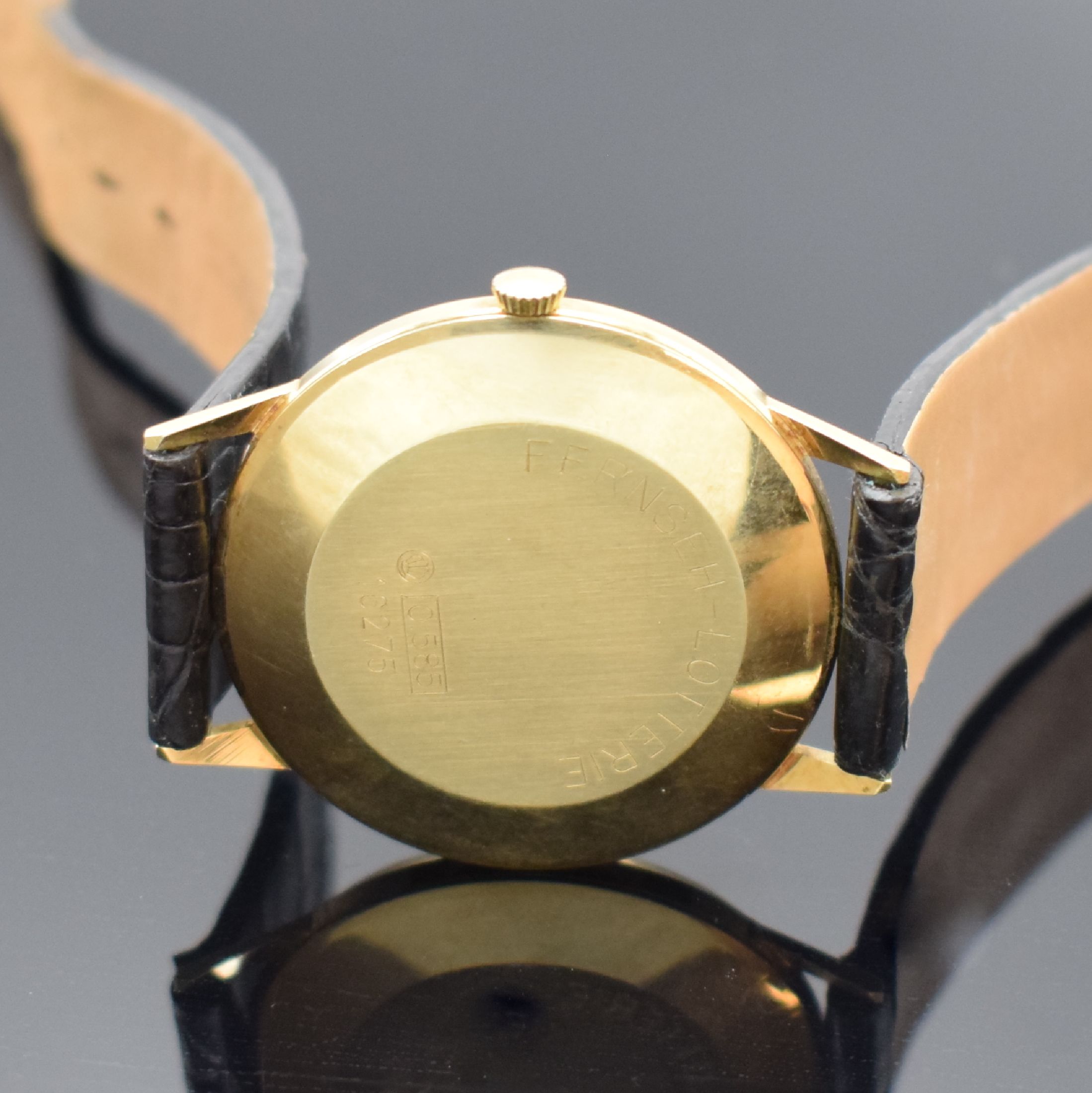 Detail c: BERGANA Herrenarmbanduhr in GG 585/000, Schweiz um 1965, Handaufzug, 2-teil. Gehäuse, Boden m. Widmung aufgedr., silb. Zifferbl. m. aufges. ...