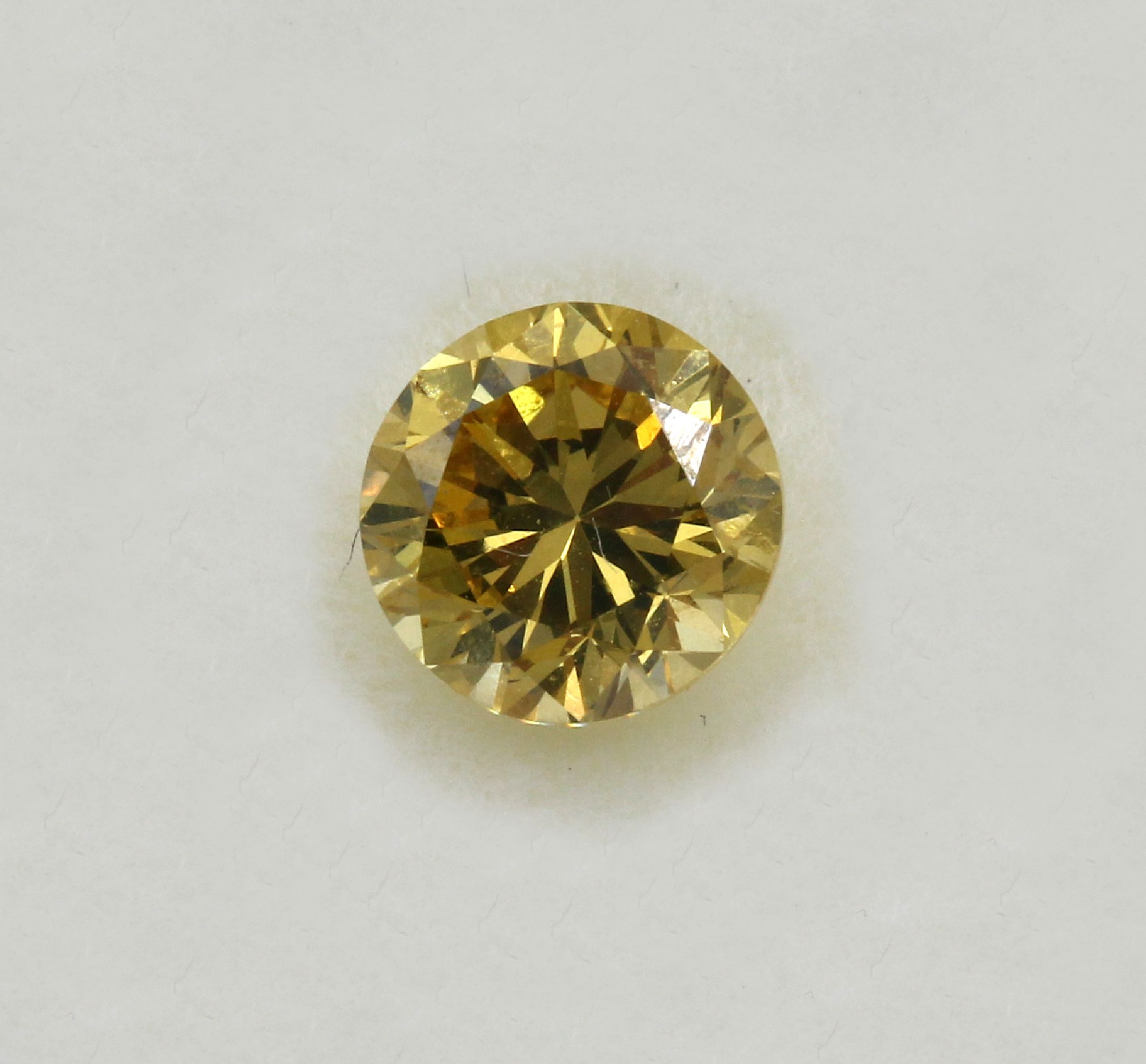 Detail a: Loser Brillant 0.86 ct Gelb (beh.)/si