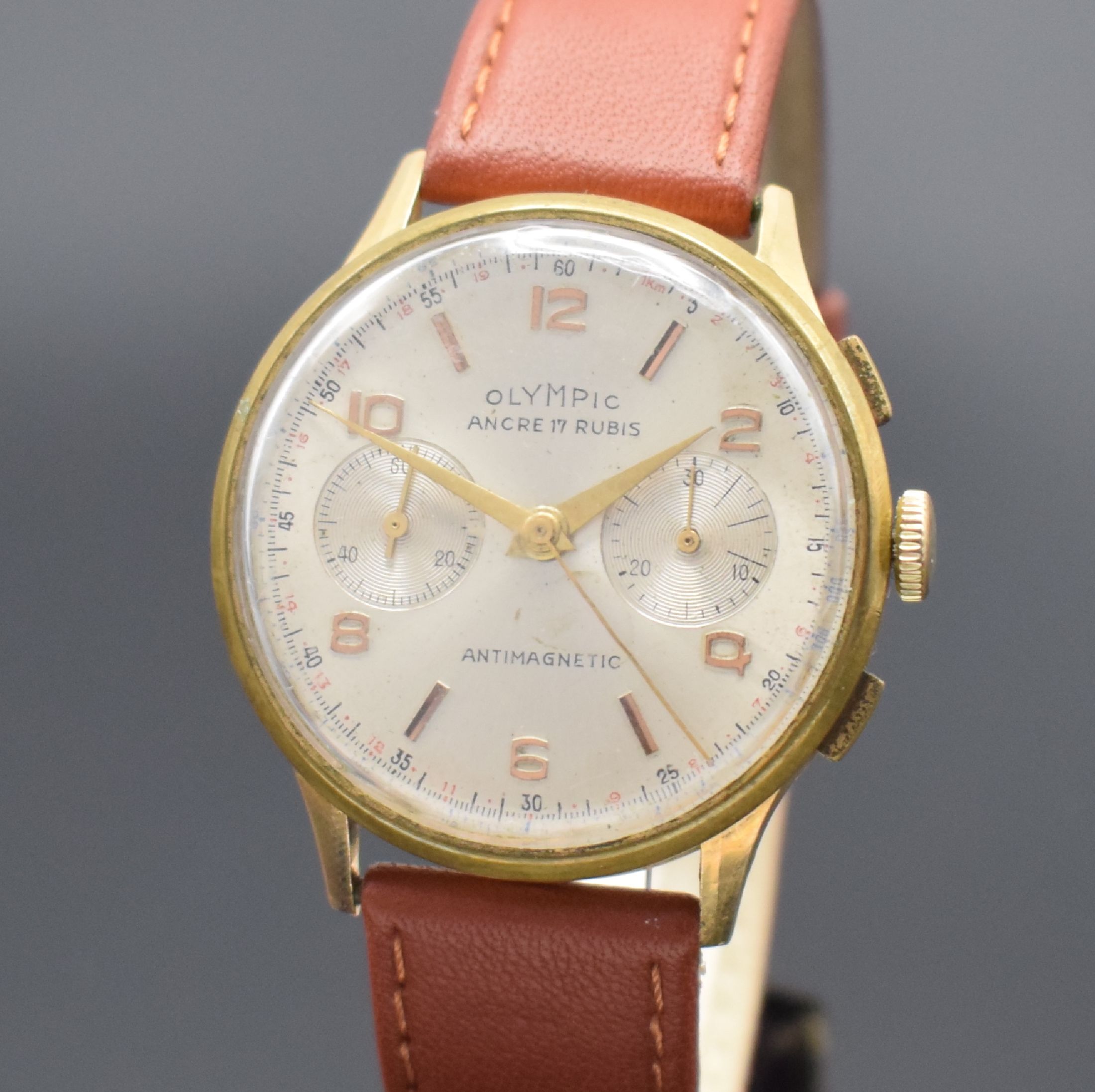 Detail a: OLYMPIC Armbandchronograph in RoseG 750/000, Handaufzug, Schweiz um 1950, Boden & verg. Glasrand aufgedr./dell., Metallcuv. zur Armierung, silb. ...
