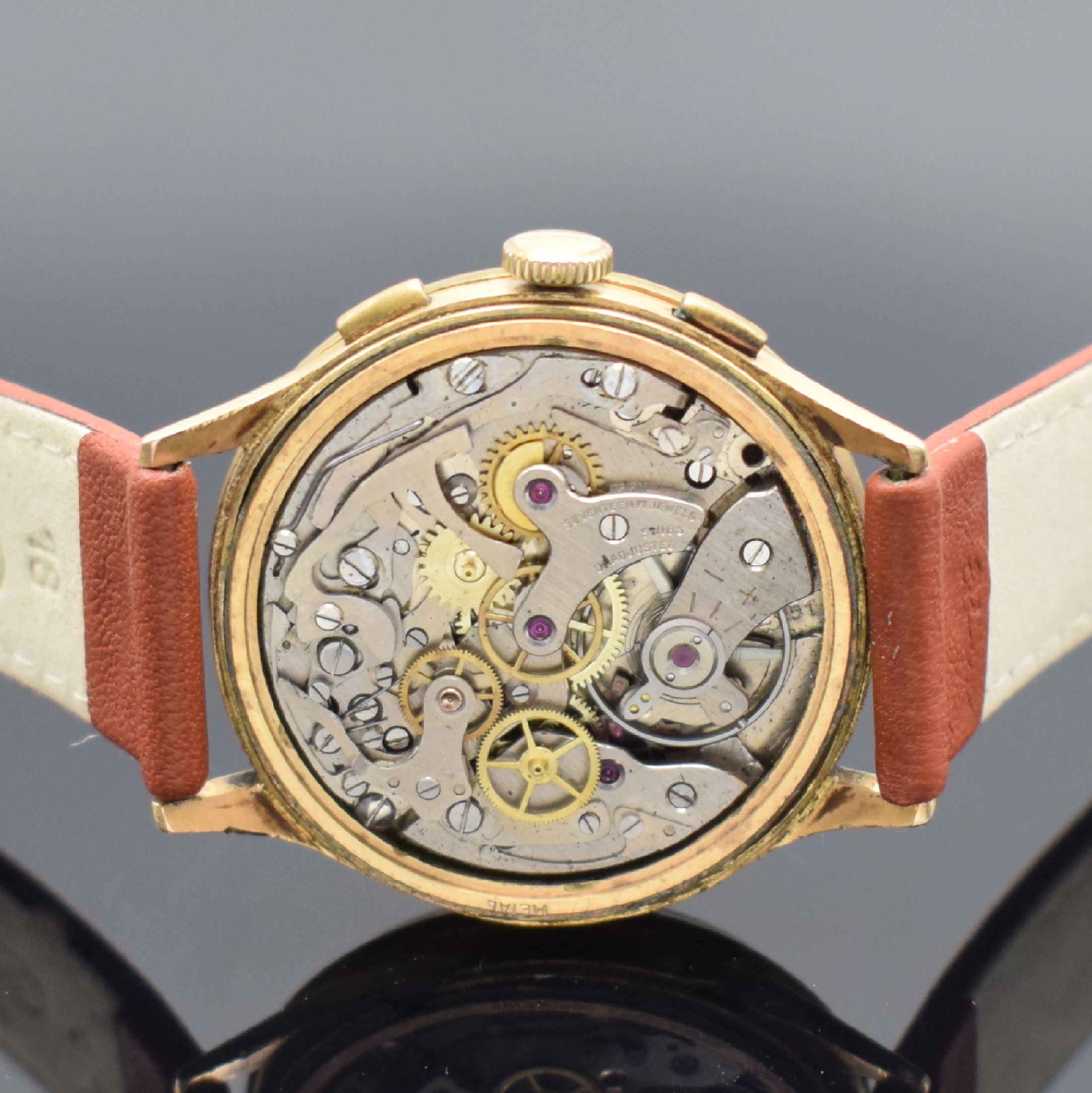 Detail e: OLYMPIC Armbandchronograph in RoseG 750/000, Handaufzug, Schweiz um 1950, Boden & verg. Glasrand aufgedr./dell., Metallcuv. zur Armierung, silb. ...