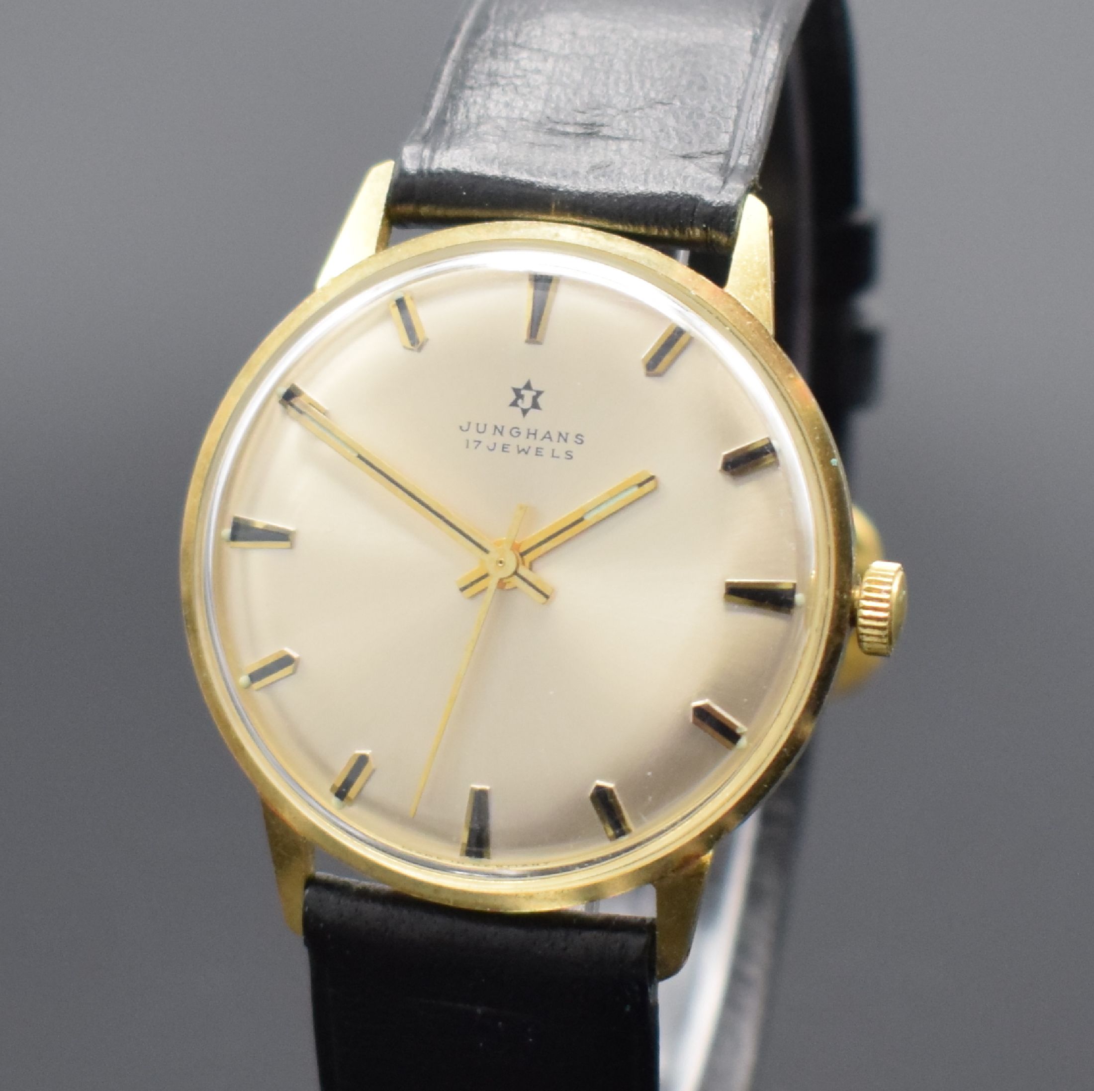 Detail a: JUNGHANS Herrenarmbanduhr in GG 585/000, Deutschland 1970er Jahre, Handaufzug, Boden aufgedr., silb. Zifferbl. m. aufges. Std.- Ind., gold. Zeiger, ...