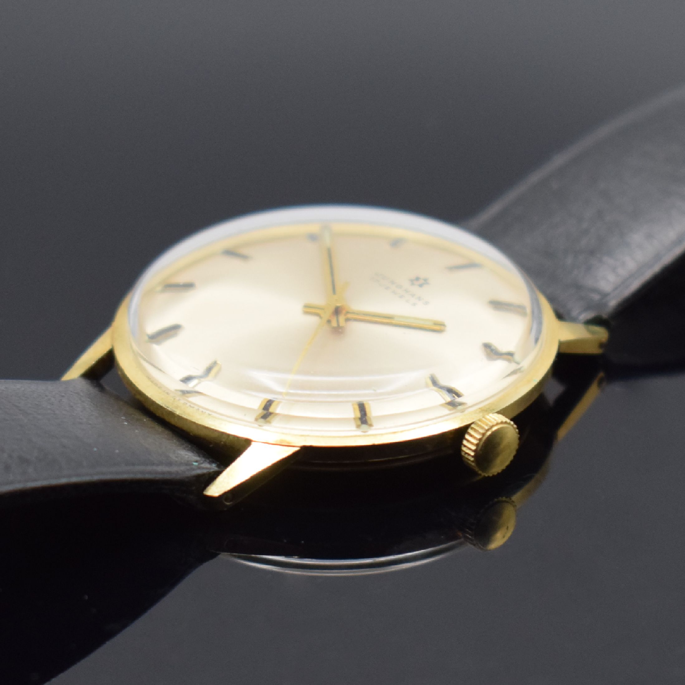 Detail b: JUNGHANS Herrenarmbanduhr in GG 585/000, Deutschland 1970er Jahre, Handaufzug, Boden aufgedr., silb. Zifferbl. m. aufges. Std.- Ind., gold. Zeiger, ...