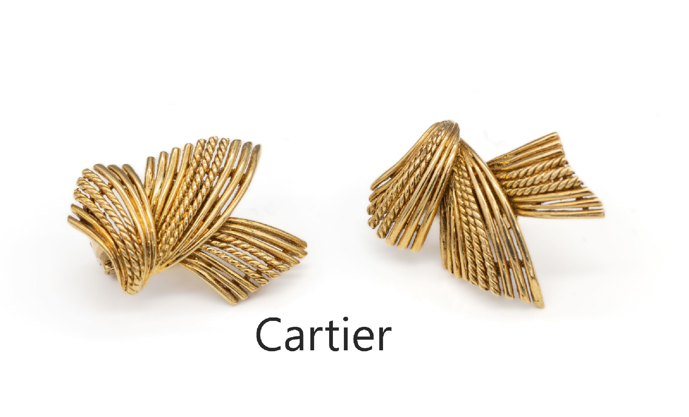 Paar 18 kt Gold CARTIER Ohrclips, GG 750/000, 1960er Jahre, abstrakte Formsprache aus einzelnen Stegen, teilw. Kordeldekor, ca. 2 x 2.5 cm, ca. 15.1 ...